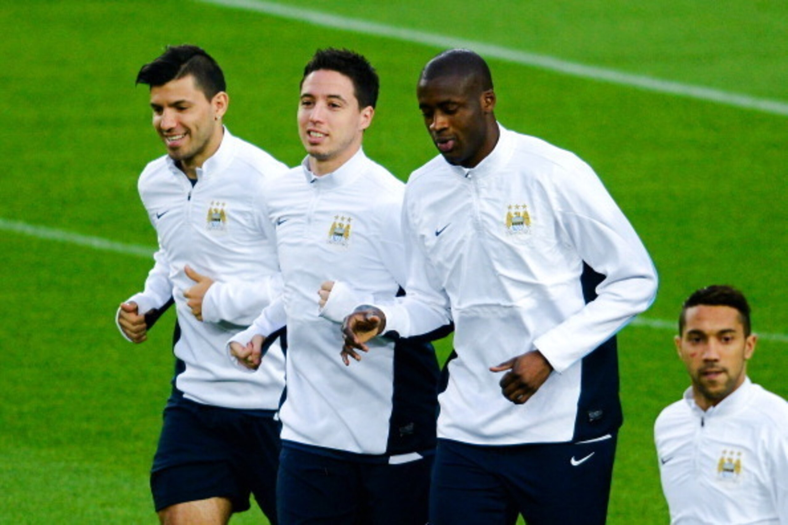 BARCELONA, SPAIN - MARCH 11: (L-R) Manchester City FC players Sergio Aguero, Samir Nasri and Yaya Toure warm up during a training session ahead the UEFA Champions League Round of 16 second leg match against FC Barcelona at Camp Nou on March 11, 2014 in Ba