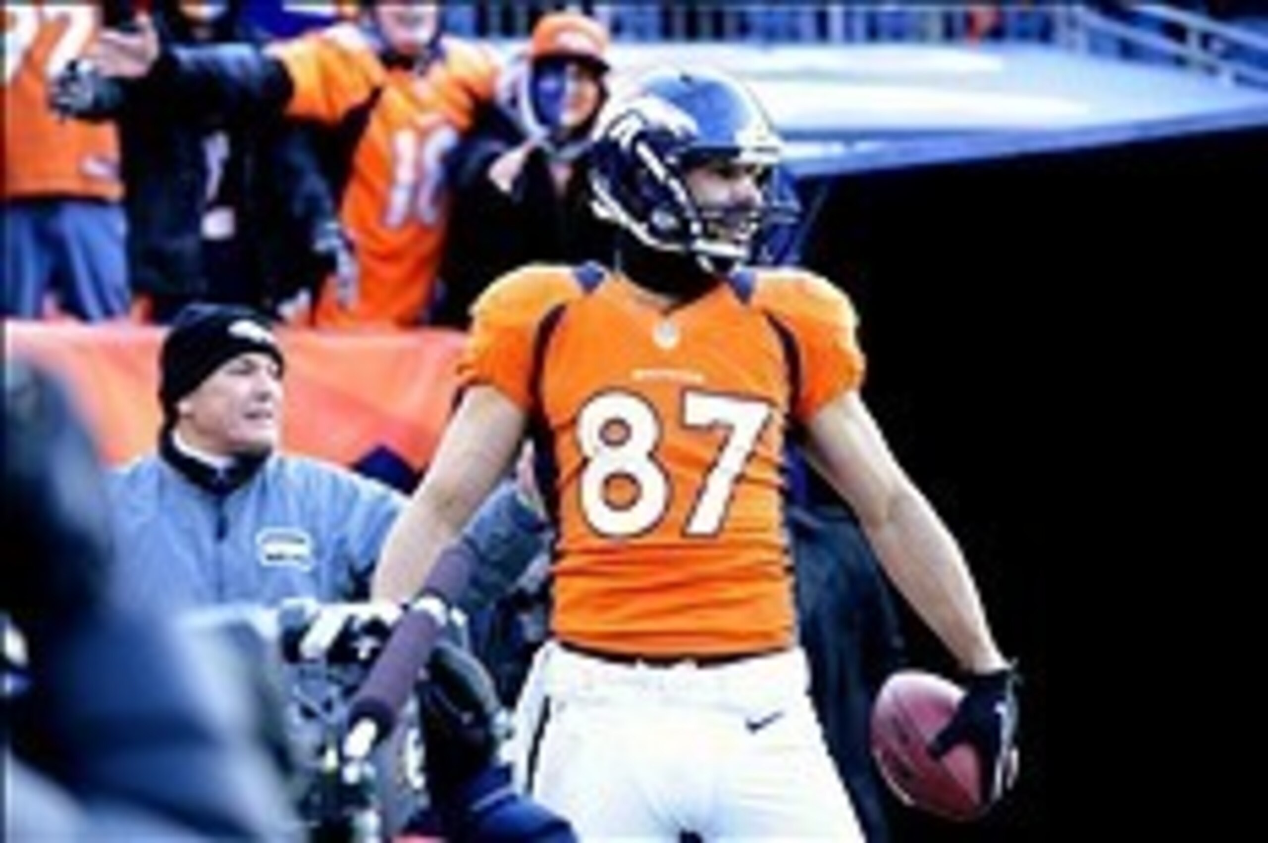 Dec 30 2012; Denver, CO, USA; Denver Broncos wide receiver Eric Decker (87) reacts catching a touchdown pass in the second quarter against the Kansas City Chiefs at Sports Authority Field. Mandatory Credit: Ron Chenoy-USA TODAY Sports