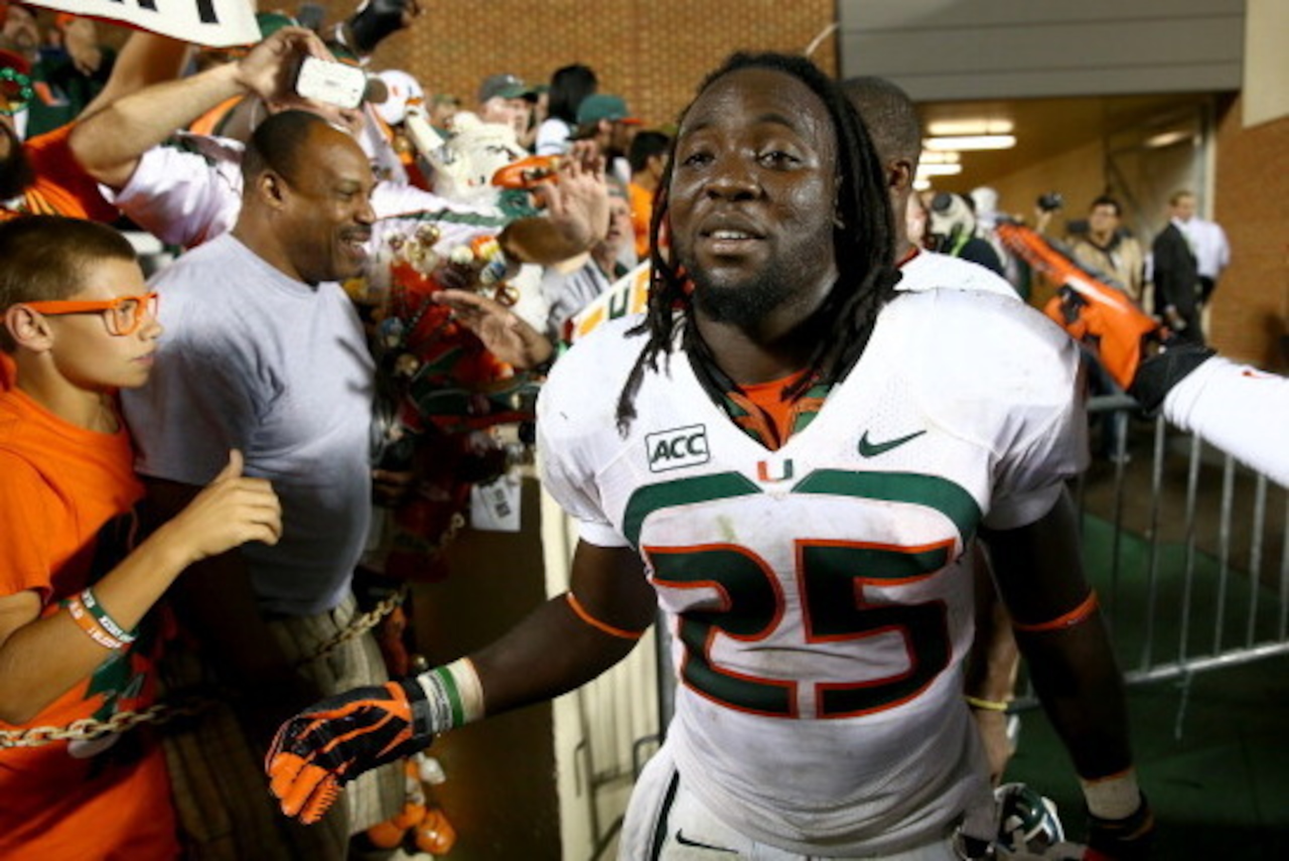 CHAPEL HILL, NC - OCTOBER 17:  Dallas Crawford #25 of the Miami Hurricanes celebrates after defeating the North Carolina Tar Heels during their game at Kenan Stadium on October 17, 2013 in Chapel Hill, North Carolina.  (Photo by Streeter Lecka/Getty Image