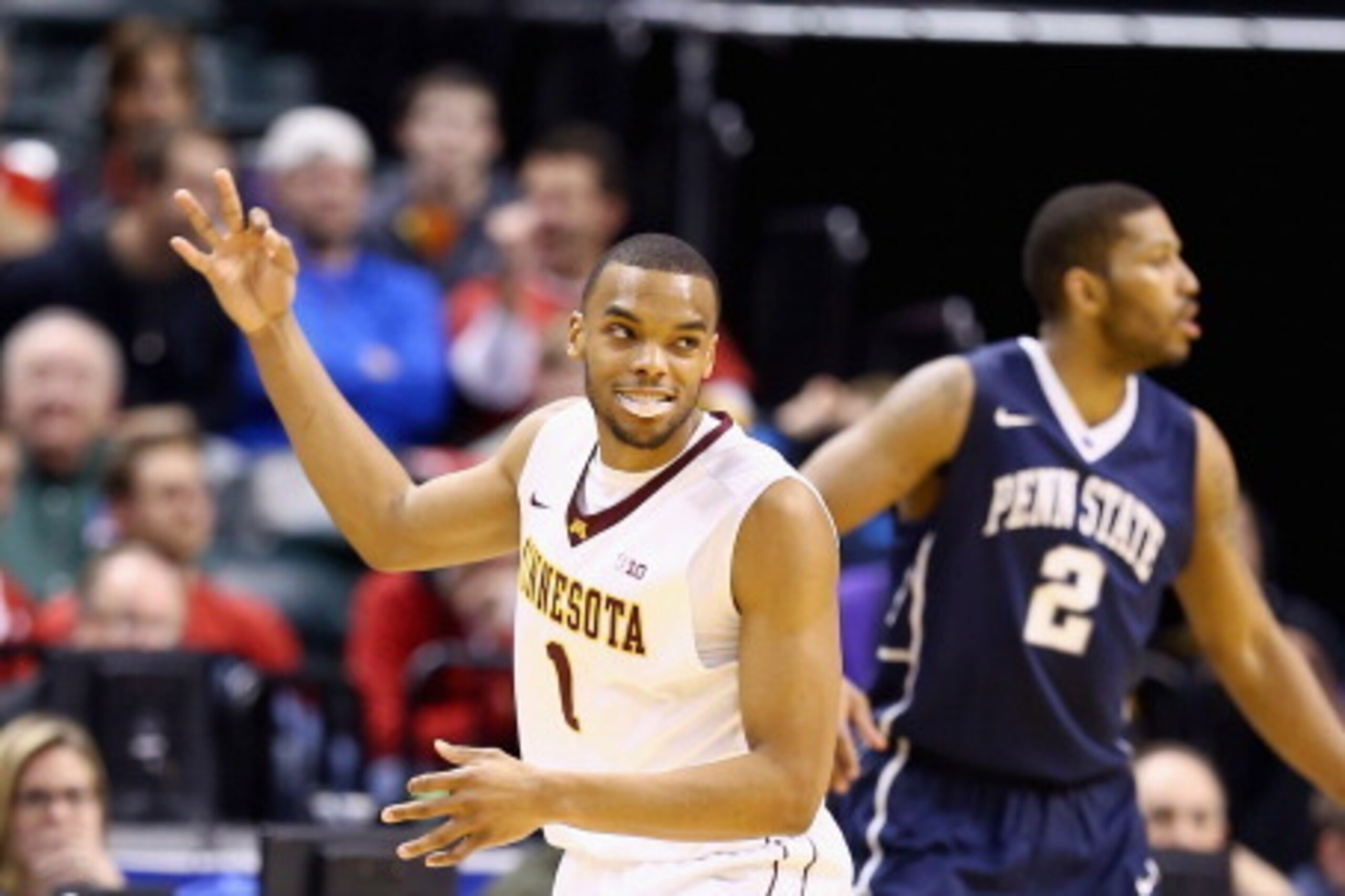 INDIANAPOLIS, IN - MARCH 13: Andre Hollins #1 of the Minnesota Golden Gophers celebrates after hitting a three point shot in the game against the Penn State Nittany Lions during the first round of the Big Ten Basketball Tournament at Bankers Life Fieldho INDIANAPOLIS, IN - MARCH 13: Andre Hollins #1 of the Minnesota Golden Gophers celebrates after hitting a three point shot in the game against the Penn State Nittany Lions during the first round of the Big Ten Basketball Tournament at Bankers Life Fieldho