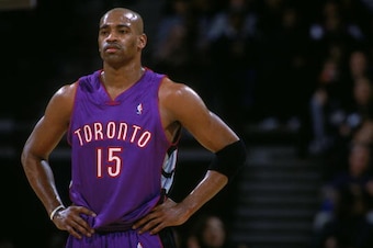 8 Dec 2000:  Vince Carter #15 of the Toronto Raptors looks on from the court during the game against the Golden State Warriors at The Arena in Oakland, California. The Raptors defeated the Warriors 108-98.    NOTE TO USER: It is expressly understood that 