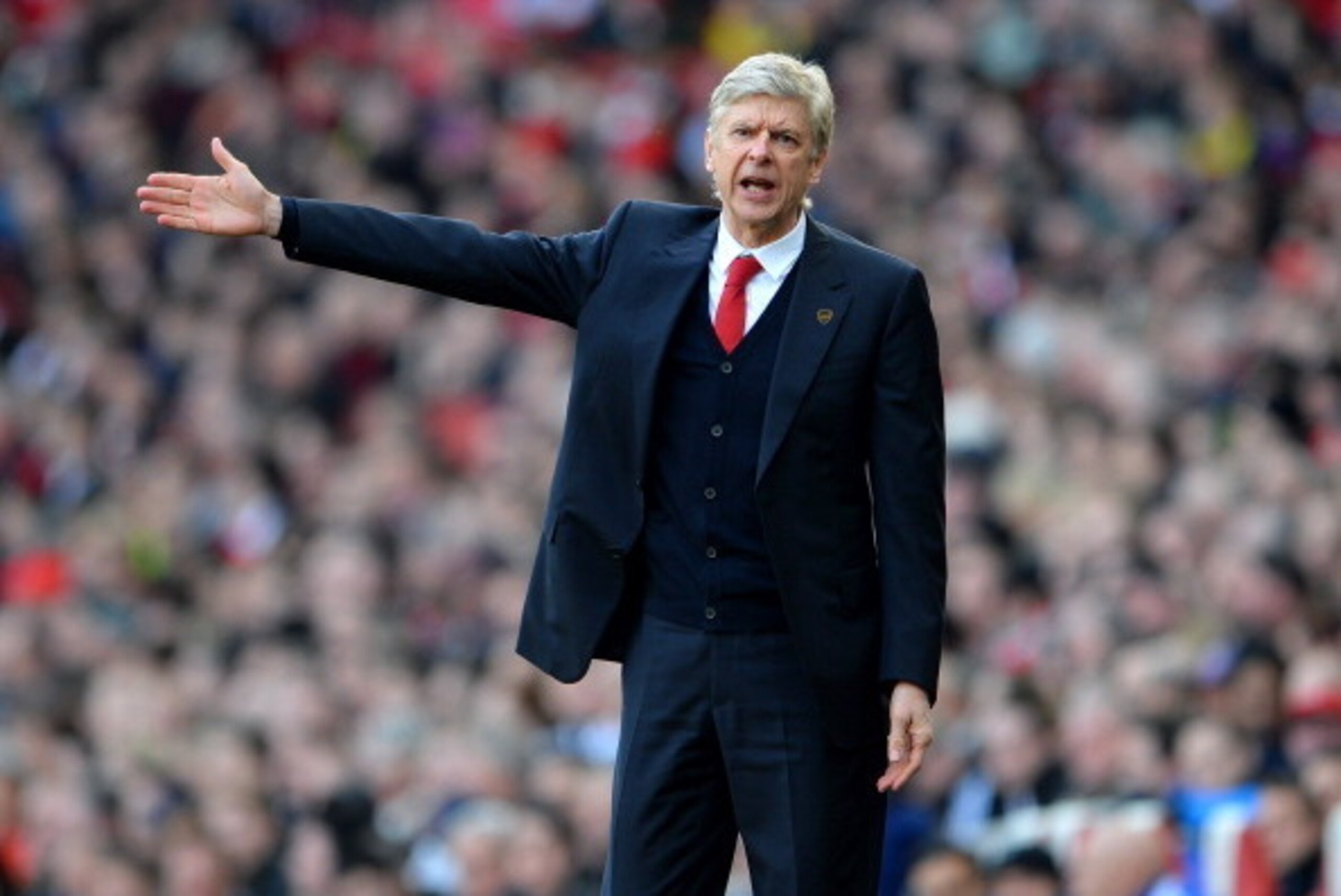 LONDON, ENGLAND - FEBRUARY 22: Arsene Wenger manager of Arsenal gestures during the Barclays Premier League match between Arsenal and Sunderland at Emirates Stadium on February 22, 2014 in London, England. (Photo by Michael Regan/Getty Images) LONDON, ENGLAND - FEBRUARY 22: Arsene Wenger manager of Arsenal gestures during the Barclays Premier League match between Arsenal and Sunderland at Emirates Stadium on February 22, 2014 in London, England. (Photo by Michael Regan/Getty Images)