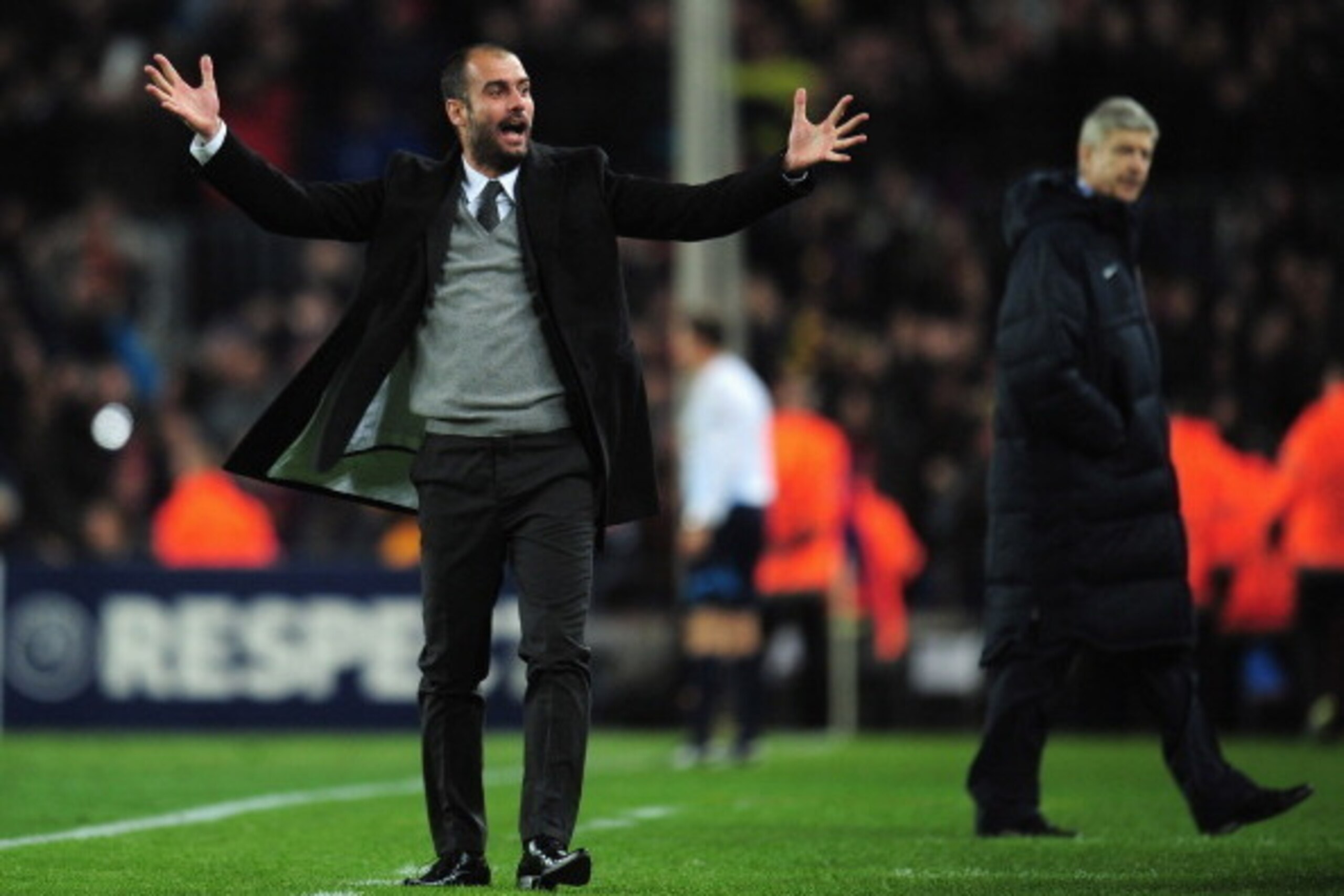 BARCELONA, SPAIN - MARCH 08: Josep Guardiola the Barcelona coach celebrates as Arsene Wenger the Arsenal coach looks on during the UEFA Champions League round of 16 second leg match between Barcelona and Arsenal at the Nou Camp Stadium on March 8, 2011 i BARCELONA, SPAIN - MARCH 08: Josep Guardiola the Barcelona coach celebrates as Arsene Wenger the Arsenal coach looks on during the UEFA Champions League round of 16 second leg match between Barcelona and Arsenal at the Nou Camp Stadium on March 8, 2011 i