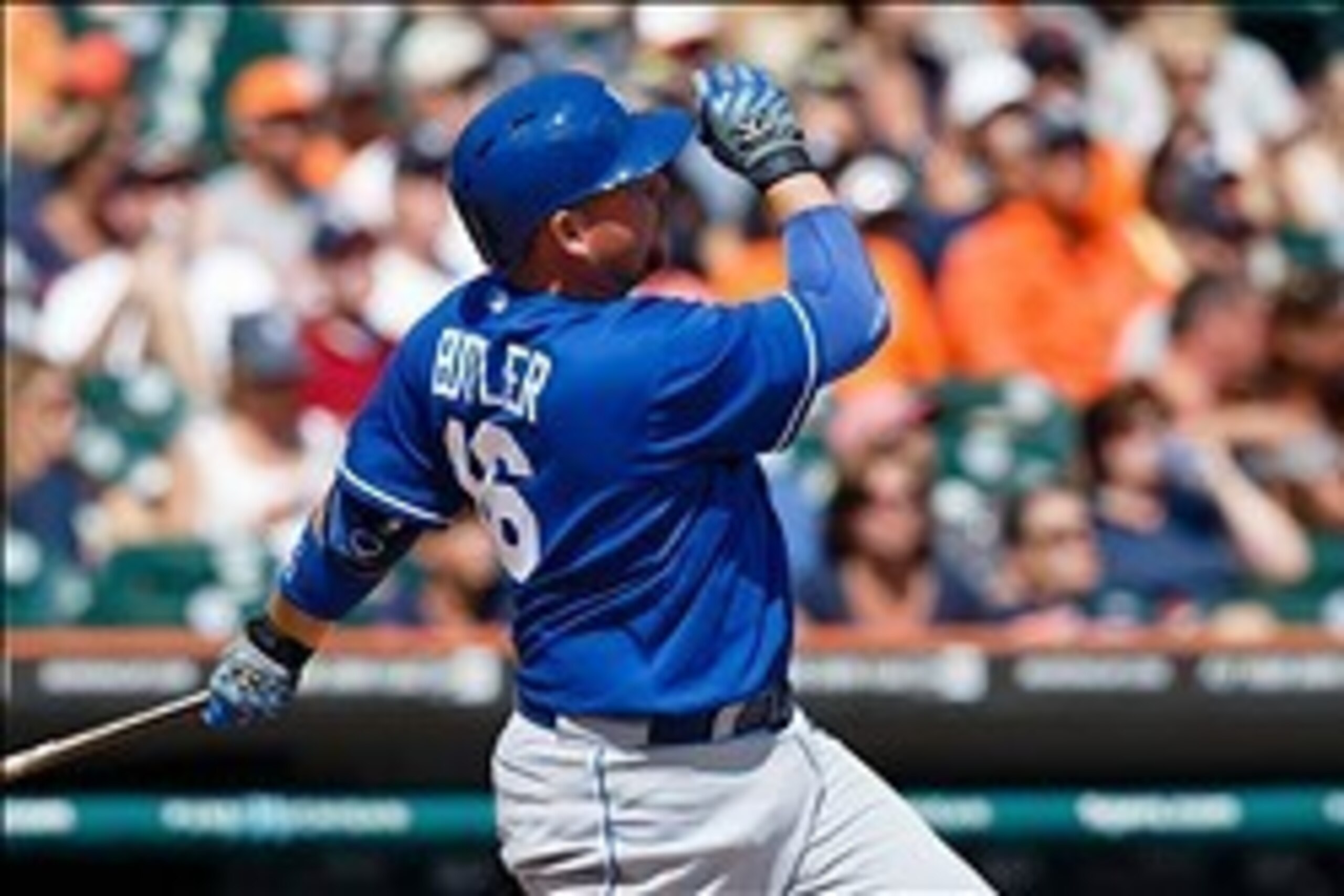 Aug 18, 2013; Detroit, MI, USA; Kansas City Royals designated hitter Billy Butler (16) hits a home run in the ninth inning against the Detroit Tigers at Comerica Park. Detroit won 6-3. Mandatory Credit: Rick Osentoski-USA TODAY Sports
