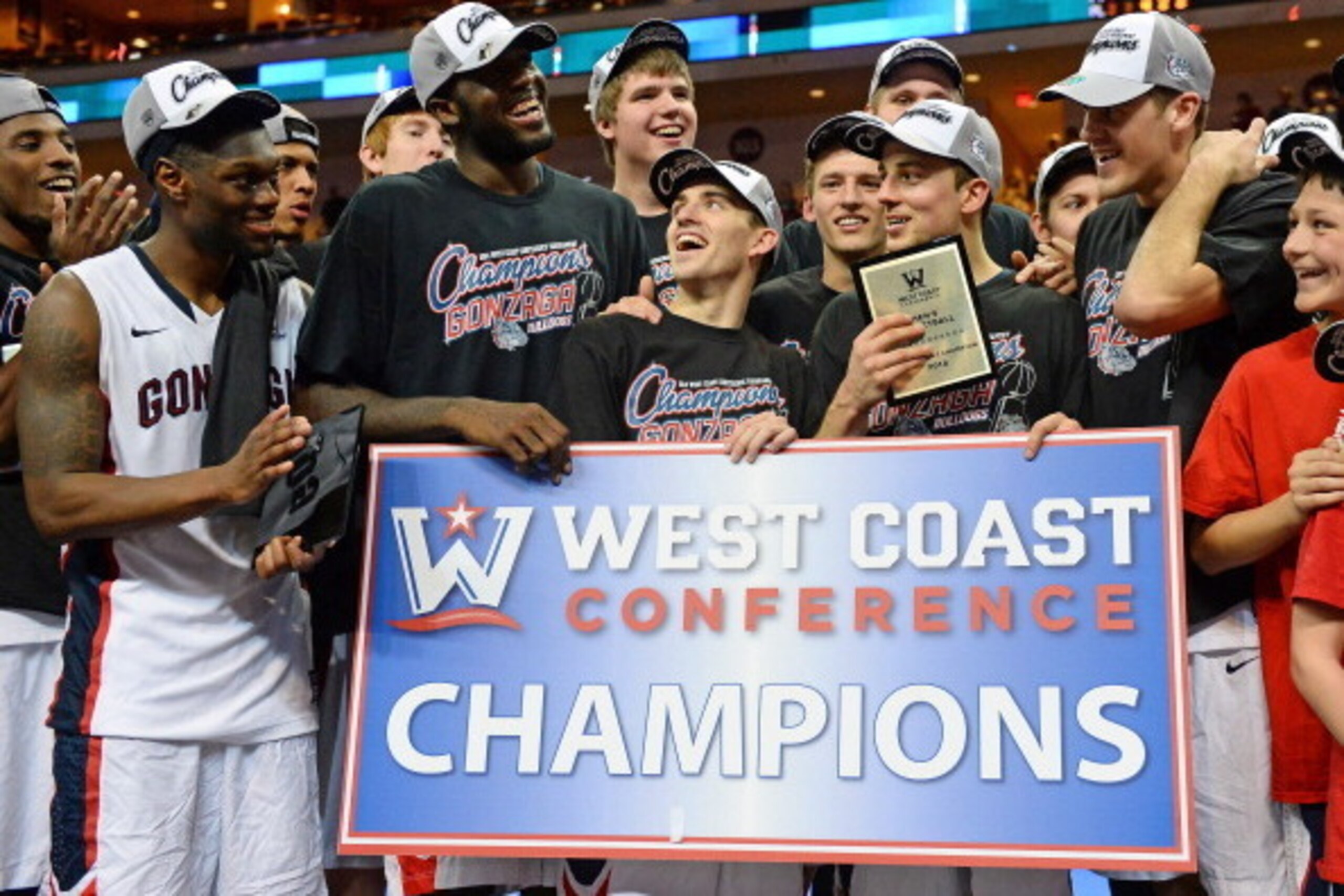 LAS VEGAS, NV - MARCH 11:  Members of the Gonzaga Bulldogs (L-R) Gary Bell Jr. #5, Sam Dower #35, David Stockton #11, Kevin Pangos #4 and Drew Barham #43 celebrate after winning the championship game of the West Coast Conference Basketball tournament 75-6