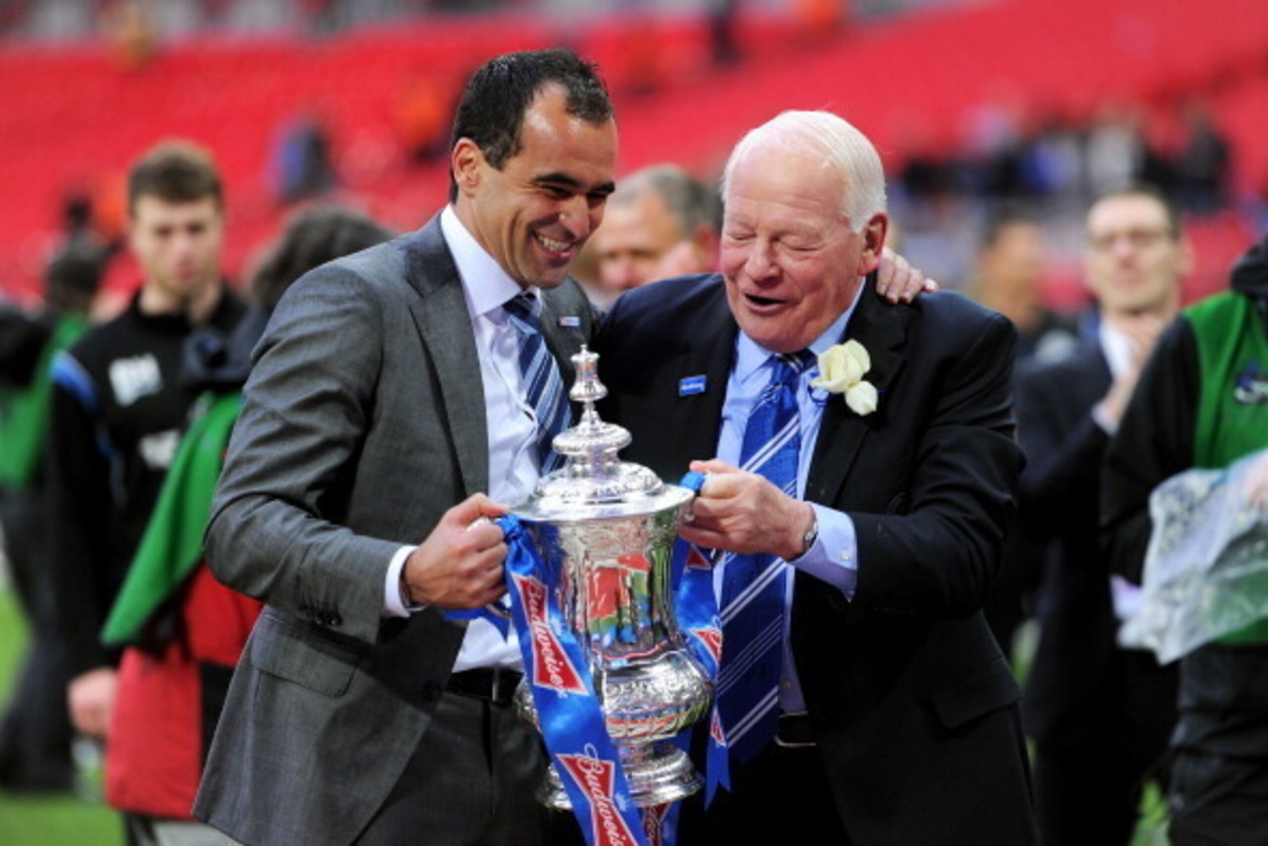 LONDON, ENGLAND - MAY 11:  (L-R) Manager Roberto Martinez of Wigan Athletic and Wigan chairman Dave Whelan celebrate with the trophy following his team's 1-0 victory during the FA Cup with Budweiser Final between Manchester City and Wigan Athletic at Wemb