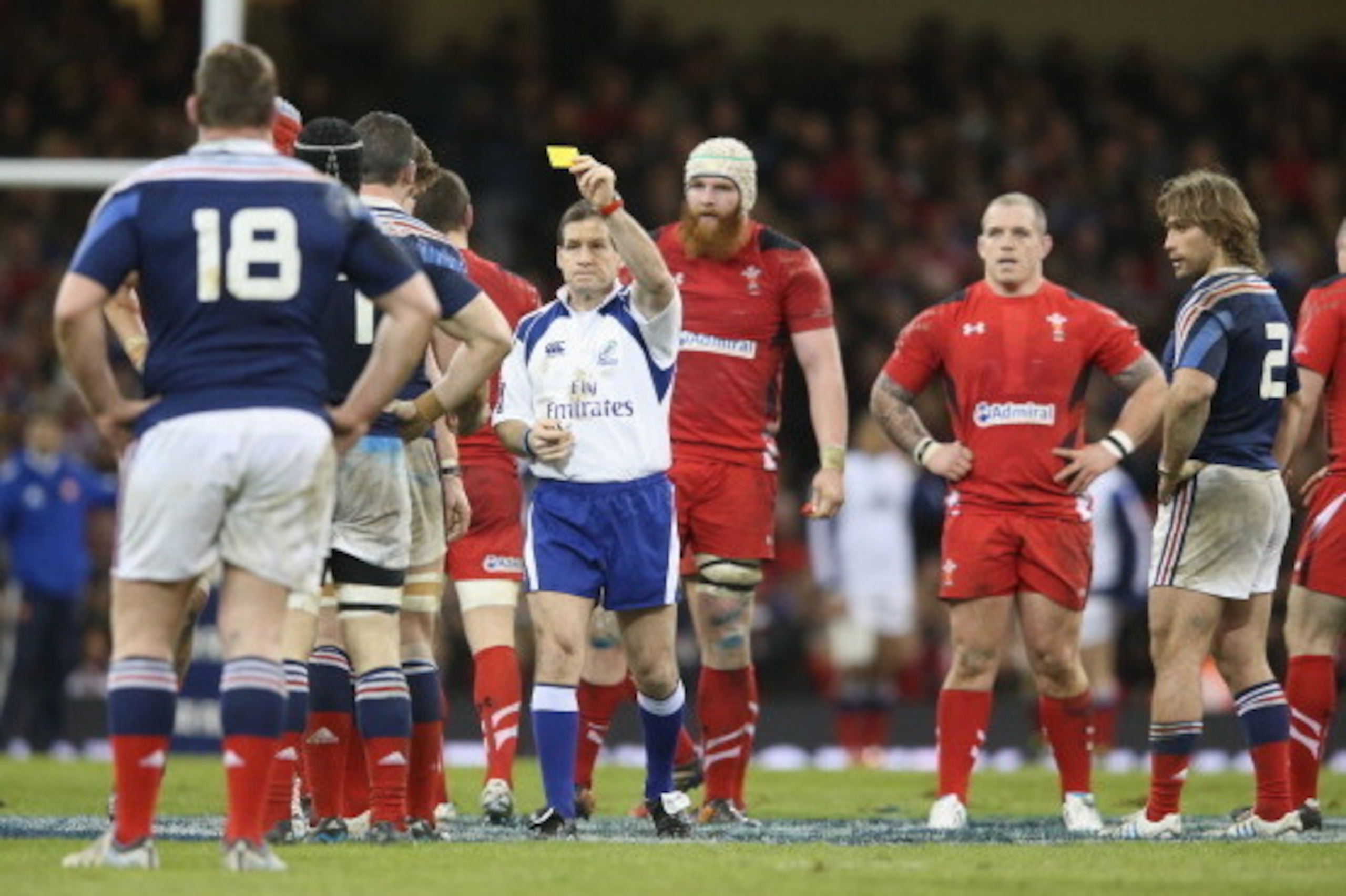 CARDIFF, WALES - FEBRUARY 21:  Referee Alain Rolland shows the yellow card to Louis Picamoles of France during the RBS Six Nations match between Wales and France at the Millennium Stadium on February 21, 2014 in Cardiff, Wales.  (Photo by David Rogers/Get
