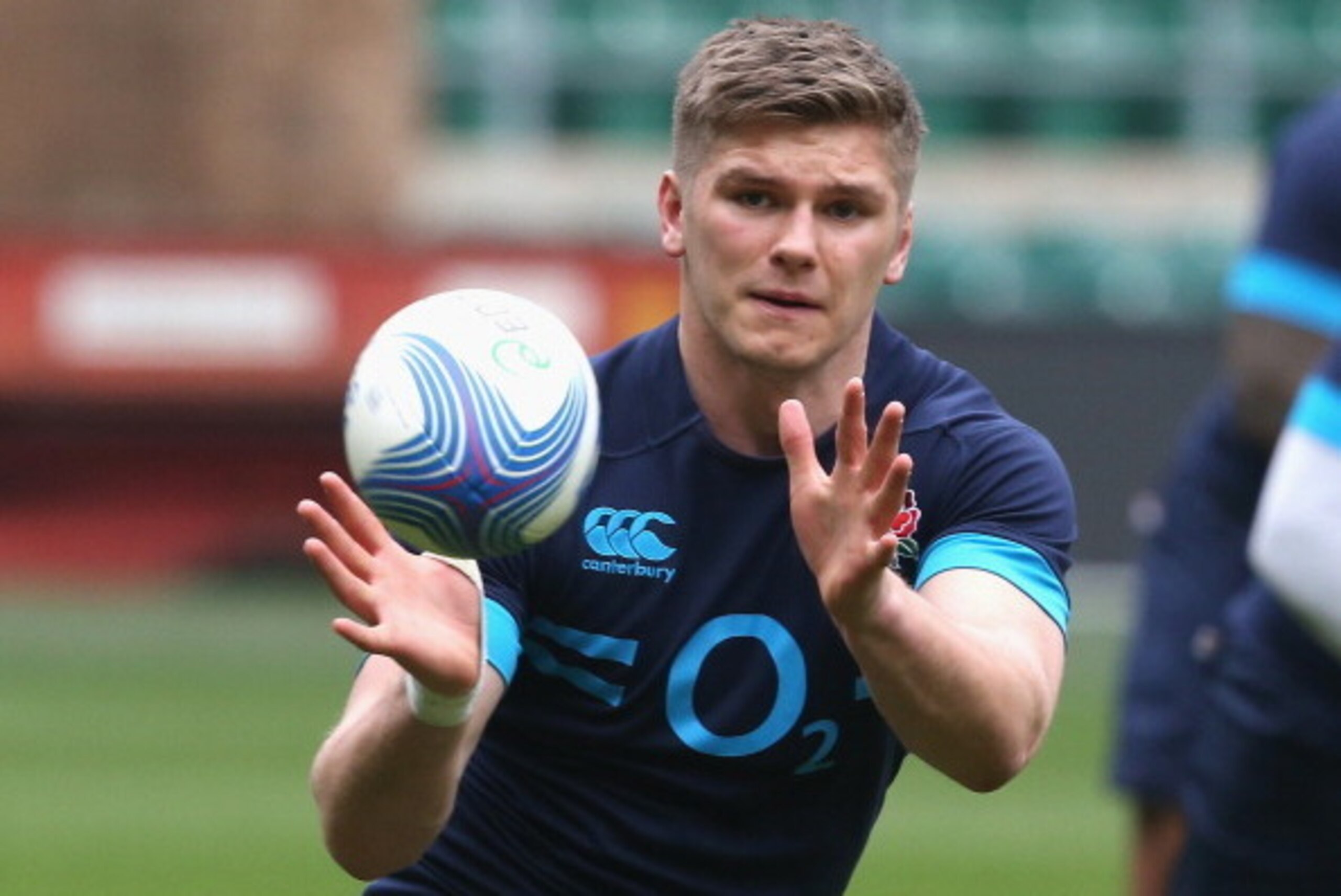 TWICKENHAM, ENGLAND - MARCH 11:  Owen Farrell catches the ball during the England training session held at Twickenham Stadium on March 11, 2014 in Twickenham, England.  (Photo by David Rogers/Getty Images)