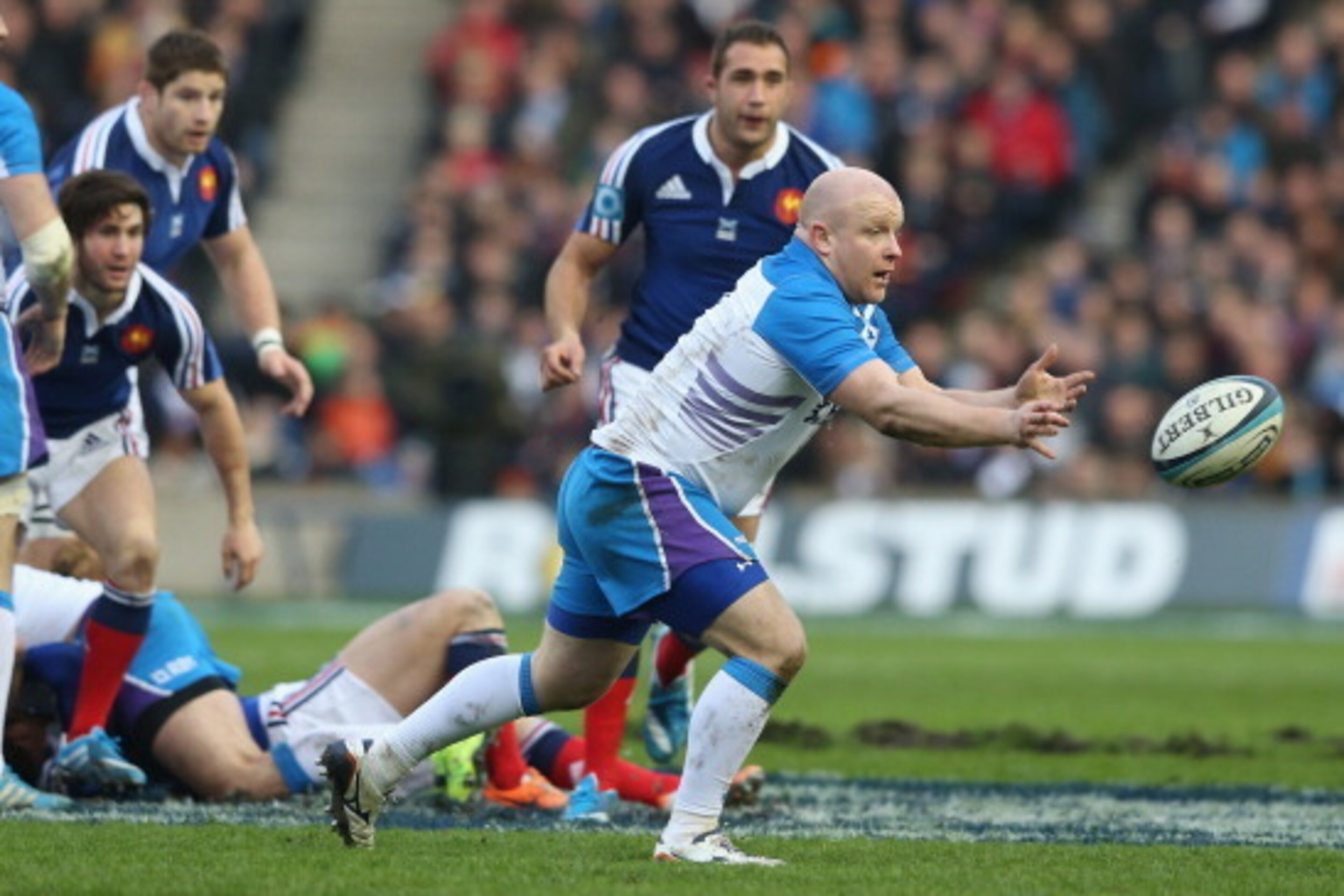 EDINBURGH, SCOTLAND - MARCH 08: Scott Lawson of Scotland passes the ball during the RBS Six Nations match between Scotland and France at Murrayfield Stadium on March 8, 2014 in Edinburgh, Scotland.  (Photo by David Rogers/Getty Images)