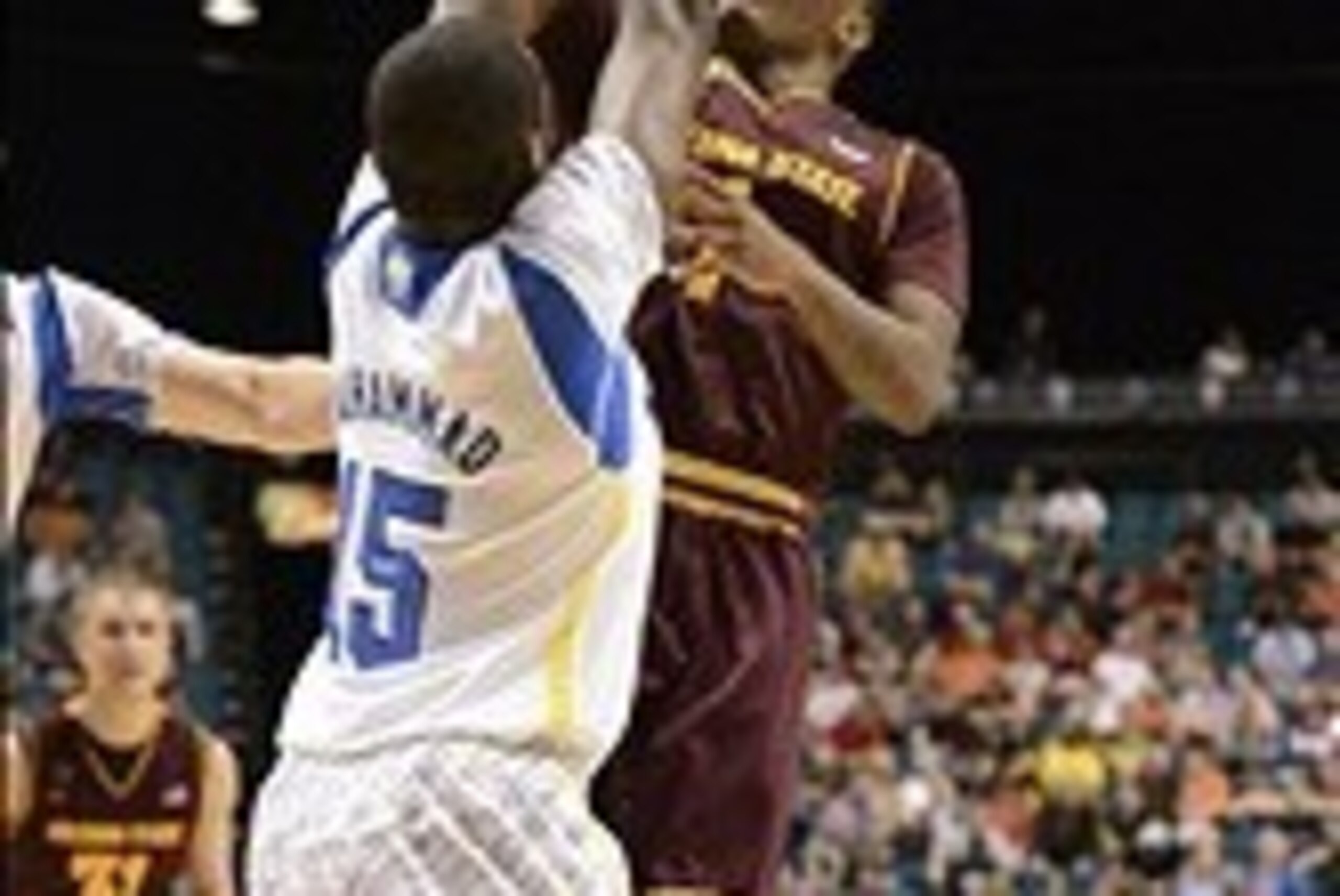 March 14, 2013; Las Vegas, NV, USA; Arizona State Sun Devils guard Jahii Carson (1) shoots against UCLA Bruins guard/forward Shabazz Muhammad (15) during the second half in the second round of the Pac 12 tournament at the MGM Grand Garden Arena. UCLA defe