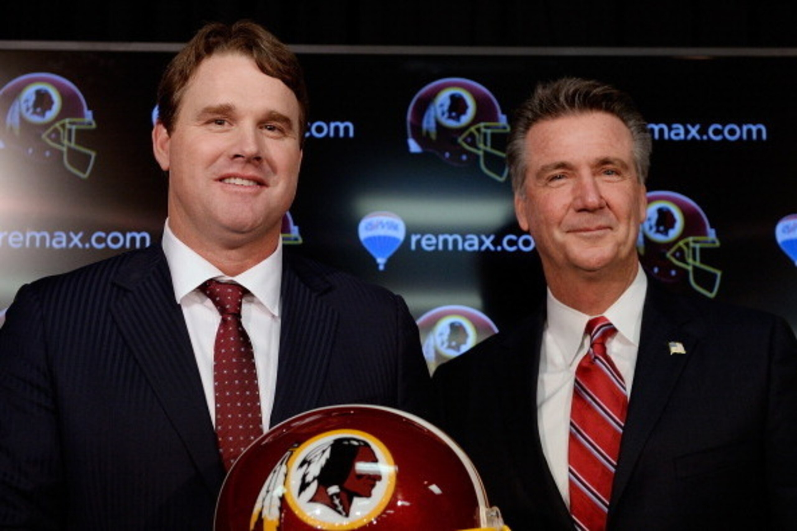 ASHBURN, VA - JANUARY 09:  Jay Gruden (L) poses for a photo with Washington Redskins Executive Vice President and General Manager Bruce Allen after he was introduced as the new head coach of the Washington Redskins during a press conference at Redskins Pa