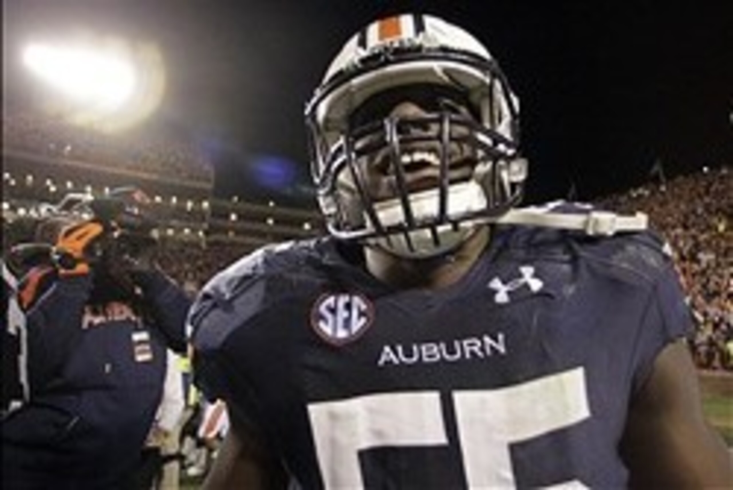 Nov 30, 2013; Auburn, AL, USA; Auburn Tigers defensive end Carl Lawson (55) reacts after defeating the Alabama Crimson Tide during the fourth quarter at Jordan Hare Stadium. Auburn Tigers won 34-28. Mandatory Credit: John Reed-USA TODAY Sports