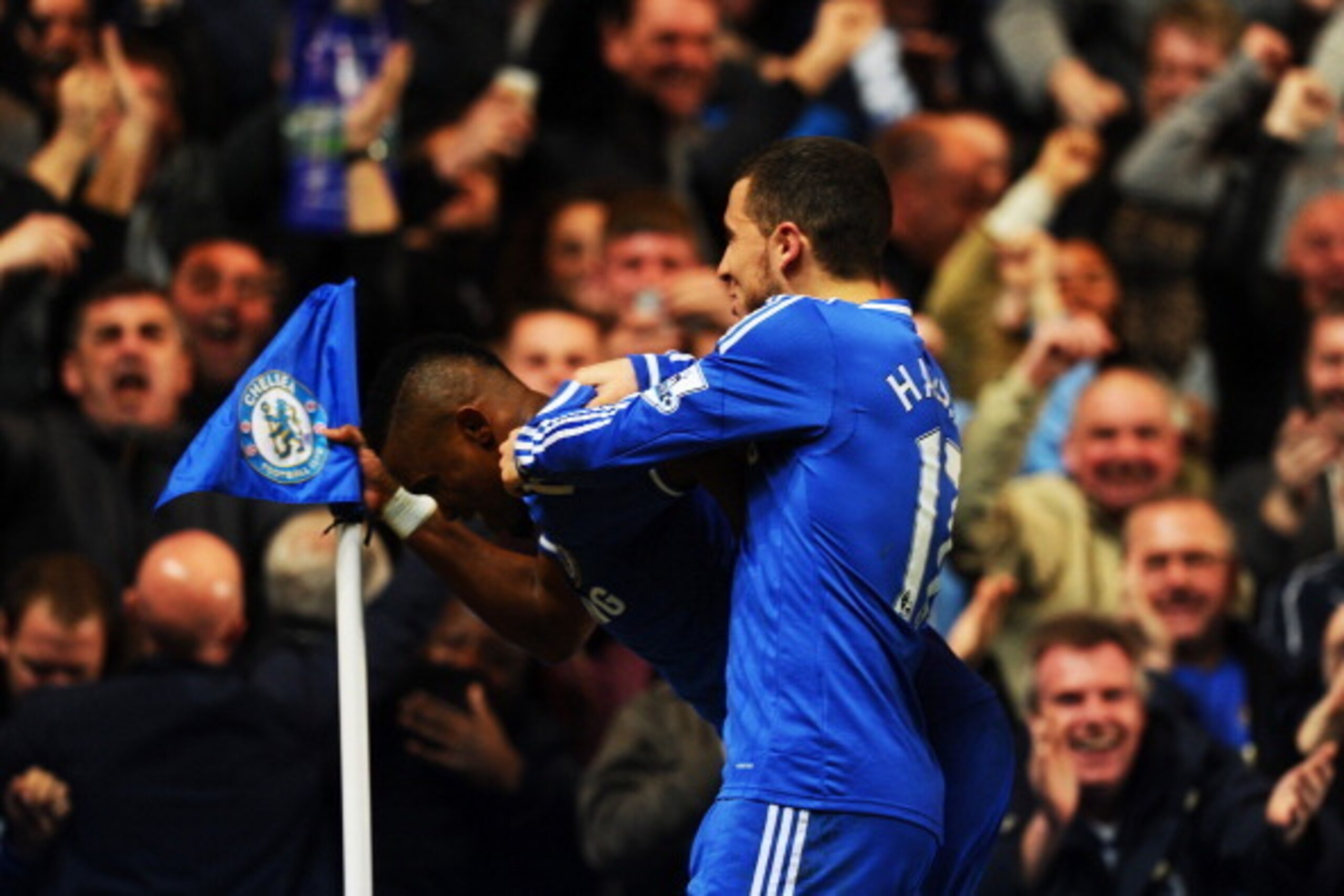 LONDON, ENGLAND - MARCH 08:  Samuel Eto'o of Chelsea does an 'Old Man' celebration after scoring his team's first goal with teammate Eden Hazard during the Barclays Premier League match between Chelsea and Tottenham Hotspur at Stamford Bridge on March 8, 