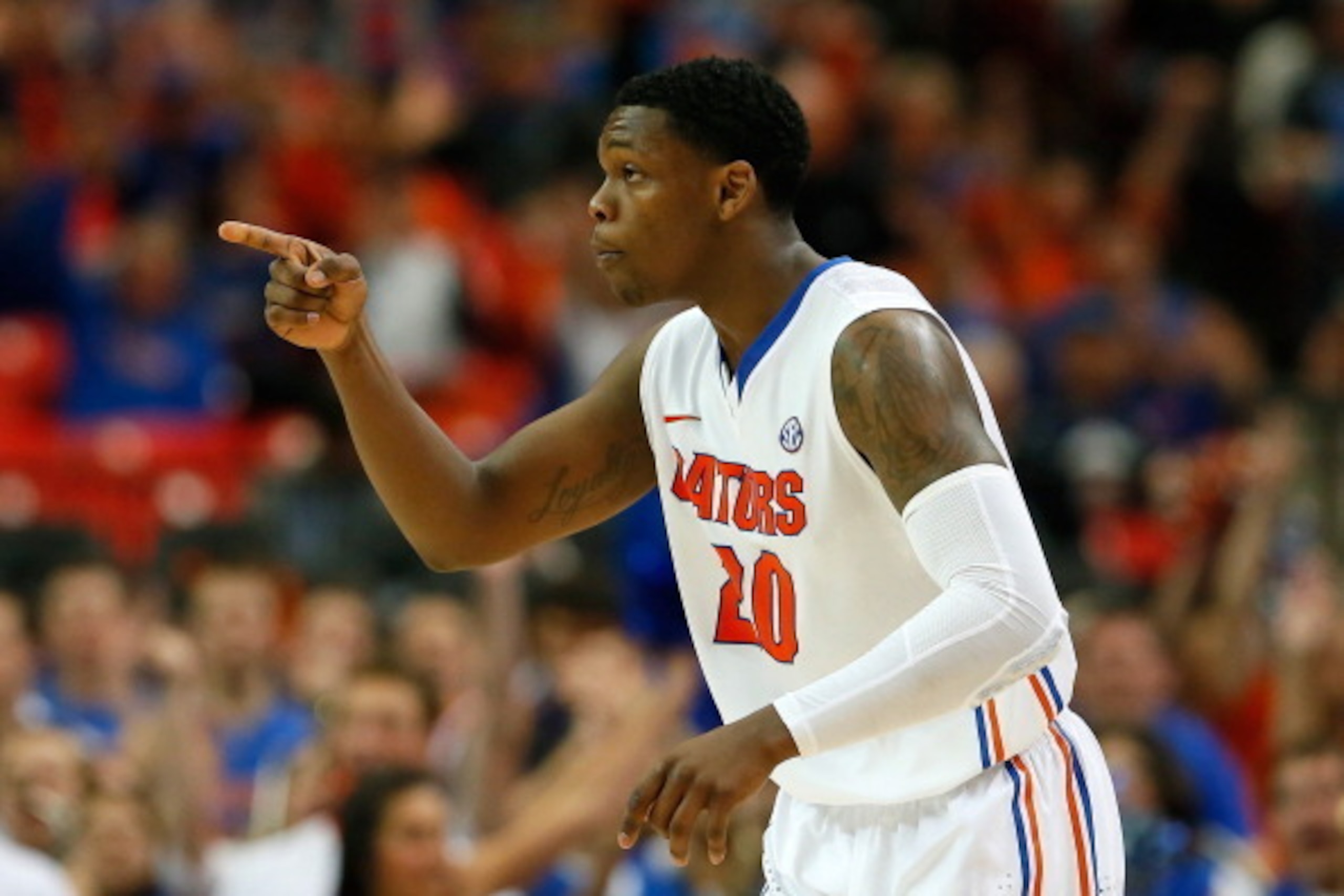 ATLANTA, GA - MARCH 14: Michael Frazier II #20 of the Florida Gators reacts after hitting a three-point basket against the Missouri Tigers during the quarterfinals of the SEC Men's Basketball Tournament at Georgia Dome on March 14, 2014 in Atlanta, Georg ATLANTA, GA - MARCH 14: Michael Frazier II #20 of the Florida Gators reacts after hitting a three-point basket against the Missouri Tigers during the quarterfinals of the SEC Men's Basketball Tournament at Georgia Dome on March 14, 2014 in Atlanta, Georg