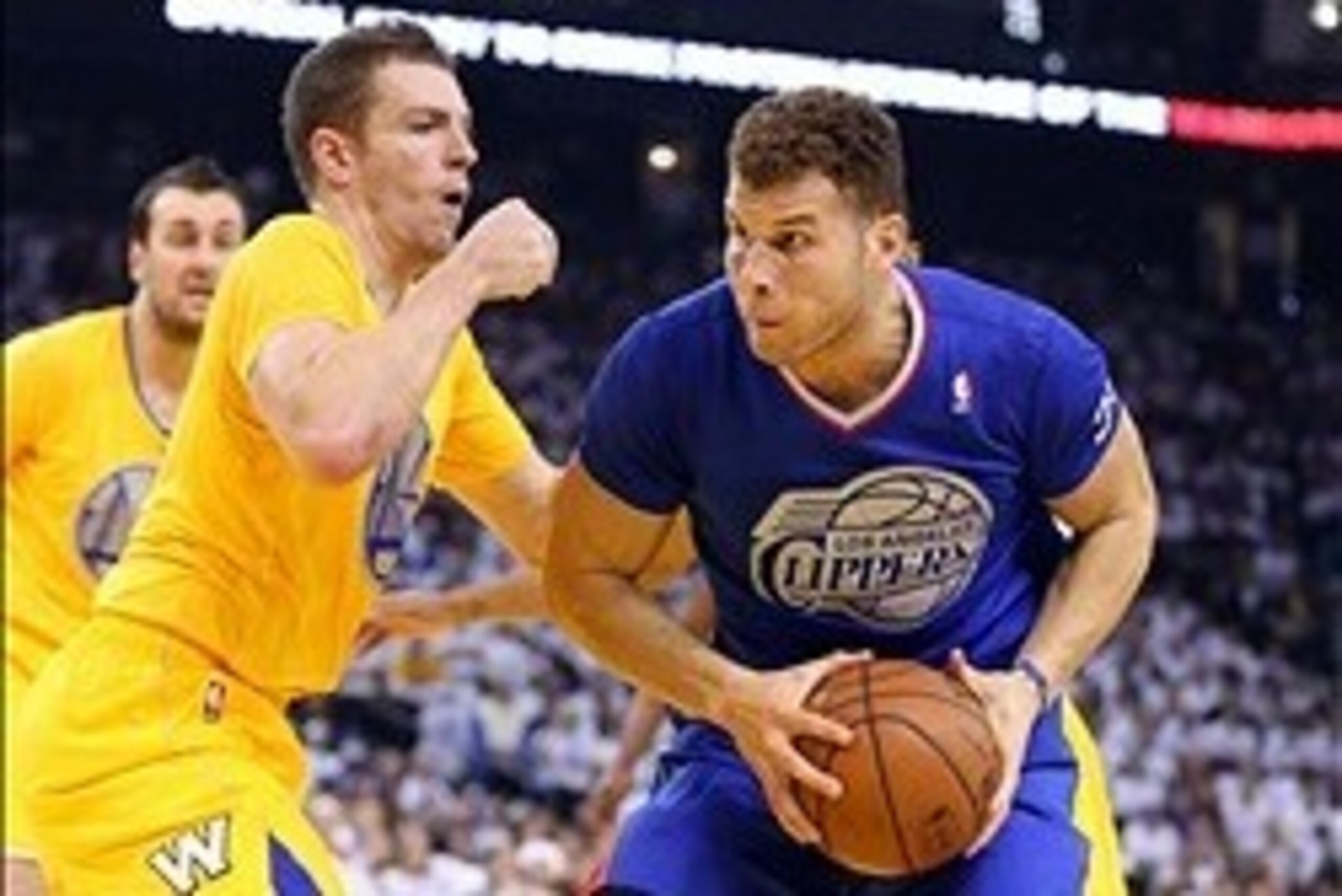 Dec 25, 2013; Oakland, CA, USA; Los Angeles Clippers power forward Blake Griffin (32) drives in against Golden State Warriors power forward David Lee (10) during the first quarter at Oracle Arena. Mandatory Credit: Kelley L Cox-USA TODAY Sports