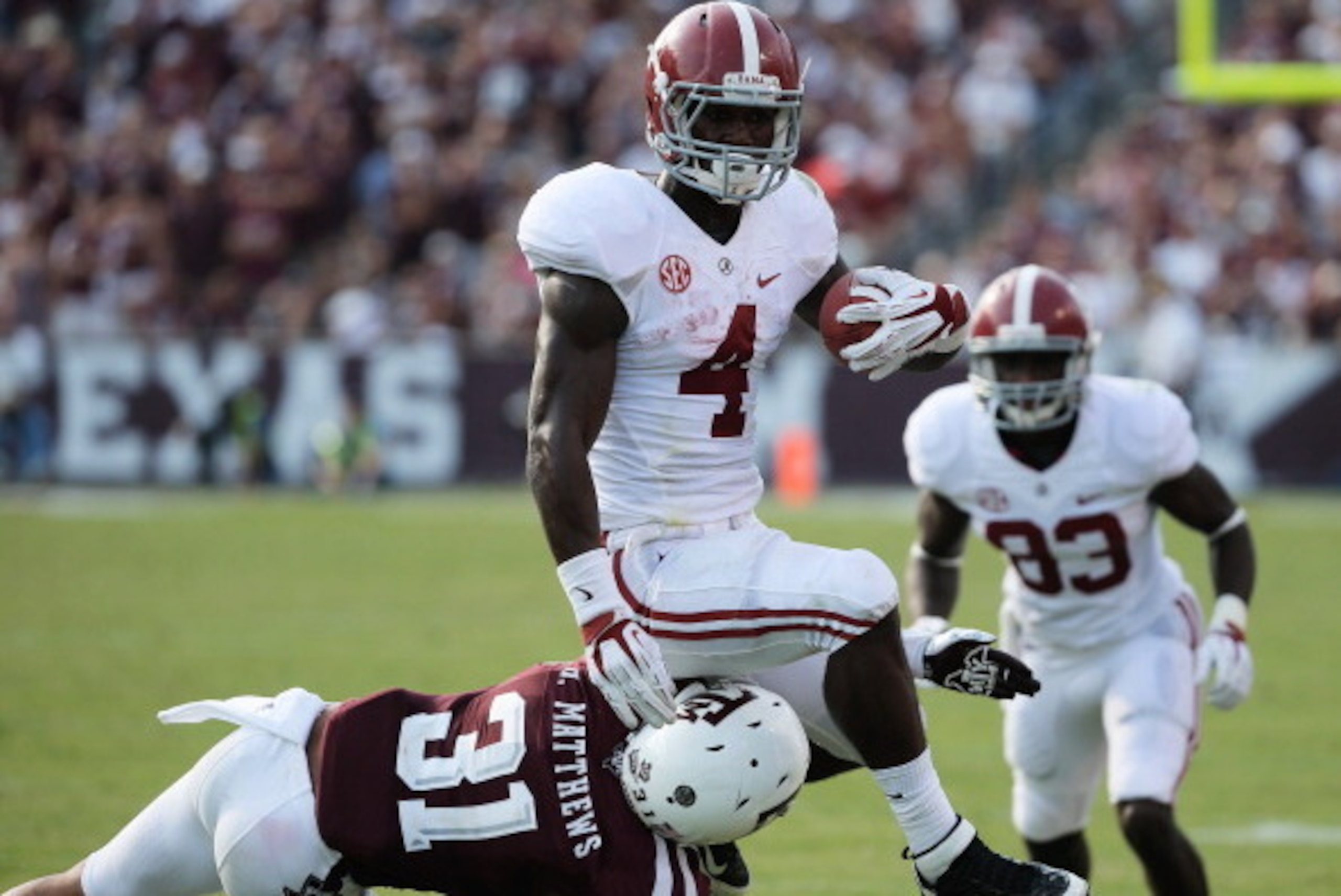 COLLEGE STATION, TX - SEPTEMBER 14: T.J. Yeldon #4 of the Alabama Crimson Tide runs against Howard Matthews #31 of Texas A&M Aggies during the game at Kyle Field on September 14, 2013 in College Station, Texas. (Photo by Scott Halleran/Getty Images) COLLEGE STATION, TX - SEPTEMBER 14: T.J. Yeldon #4 of the Alabama Crimson Tide runs against Howard Matthews #31 of Texas A&M Aggies during the game at Kyle Field on September 14, 2013 in College Station, Texas. (Photo by Scott Halleran/Getty Images)