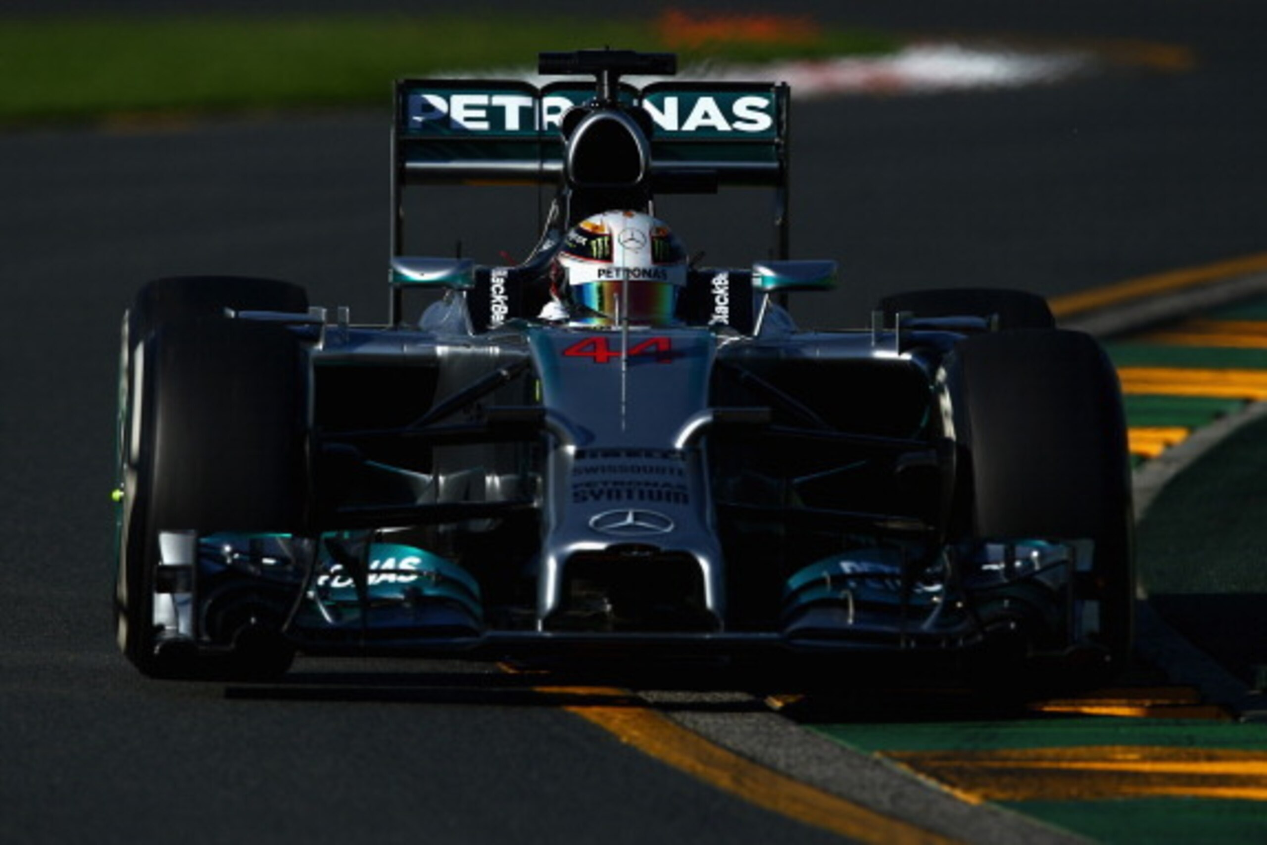 MELBOURNE, AUSTRALIA - MARCH 14:  Lewis Hamilton of Great Britain and Mercedes GP drives during practice for the Australian Formula One Grand Prix at Albert Park on March 14, 2014 in Melbourne, Australia.  (Photo by Clive Mason/Getty Images)