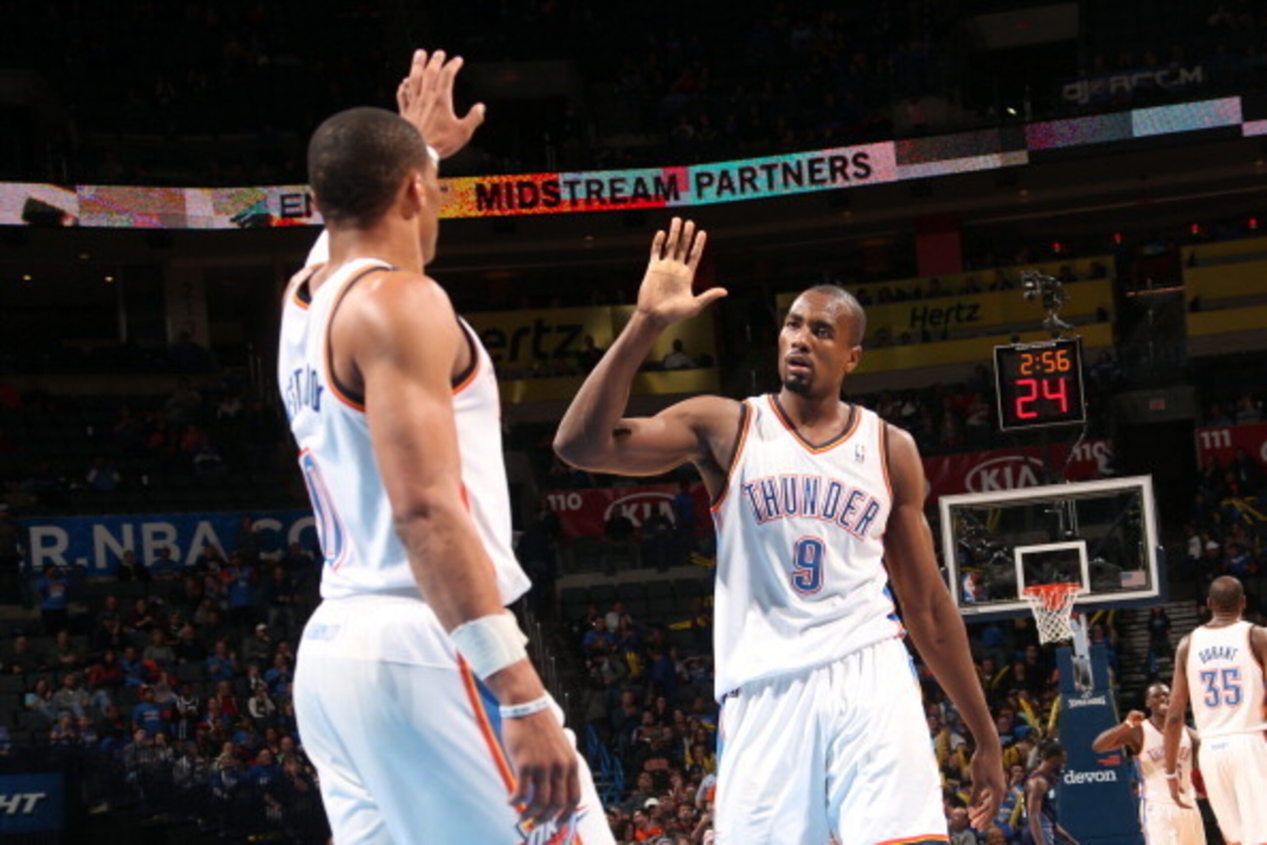 OKLAHOMA CITY, OK - MARCH 3: Russell Westbrook #0 and Serge Ibaka #9 of the Oklahoma City Thunder celebrate during a game against the Charlotte Bobcats on March 3, 2014 at the Chesapeake Energy Arena in Oklahoma City, Oklahoma. NOTE TO USER: User expressl