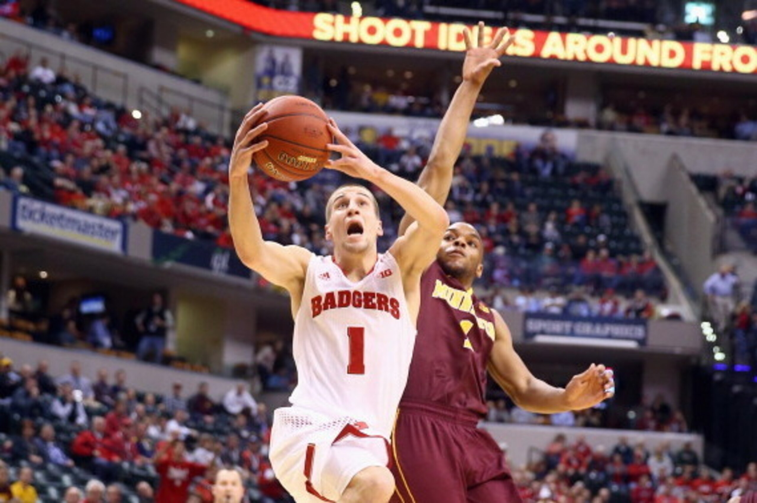 INDIANAPOLIS, IN - MARCH 14:  Ben Brust #1 of the Wisconsin Badgers shoots the ball in the game against the Minnesota Golden Gophers during the Quarterfinals of the Big Ten Basketball Tournament at Bankers Life Fieldhouse on March 14, 2014 in Indianapolis