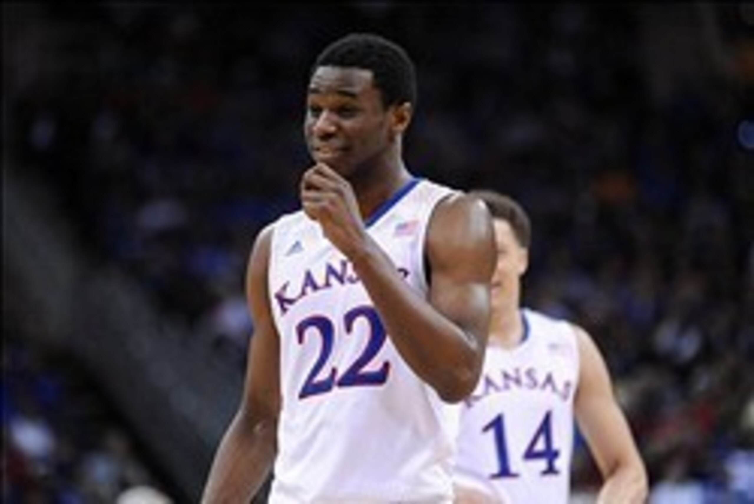 Mar 13, 2014; Kansas City, MO, USA; Kansas Jayhawks guard Andrew Wiggins (22) laughs while on the foul line during the second half against the Oklahoma State Cowboys in the second round of the Big 12 Conference college basketball tournament at Sprint Cent