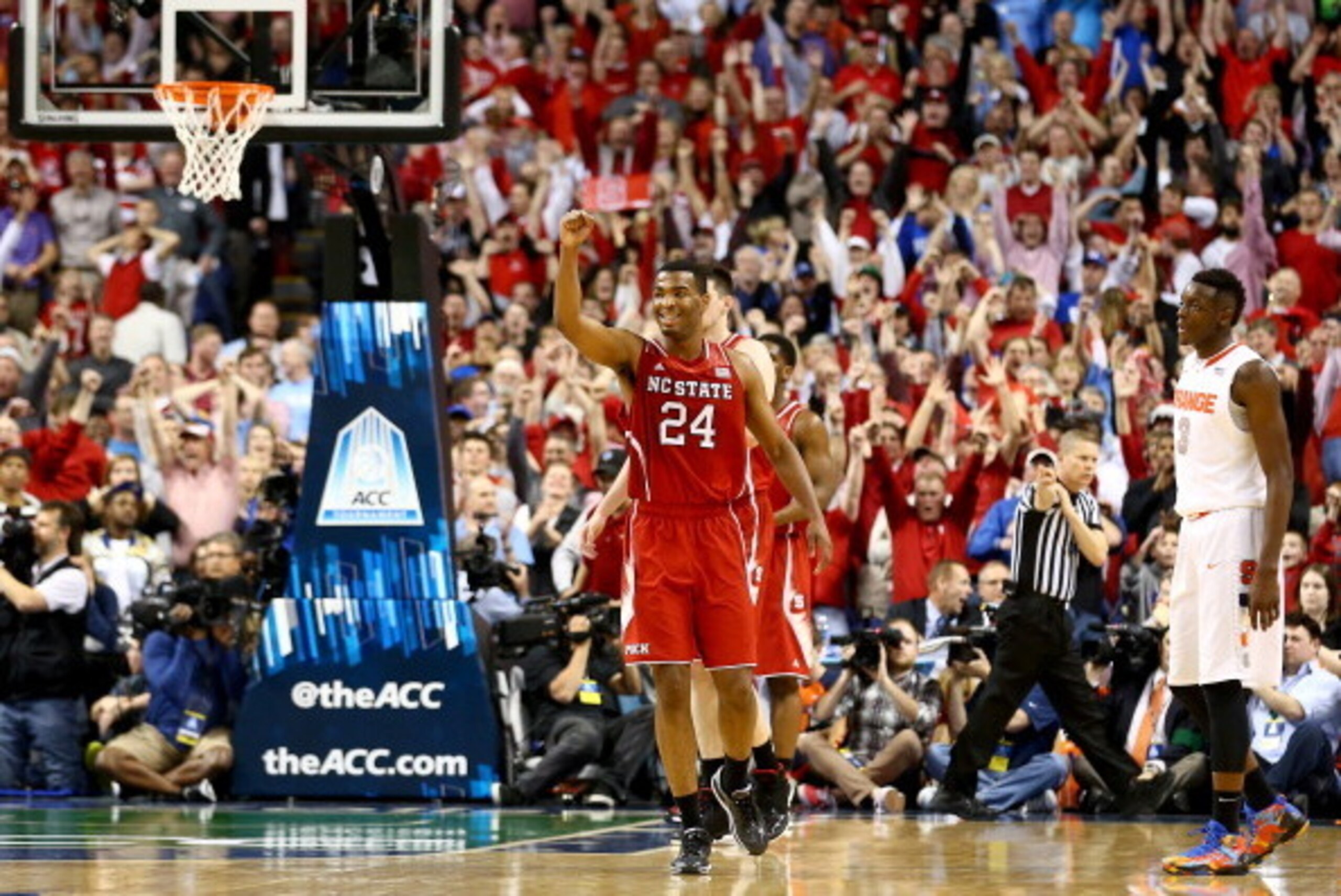 GREENSBORO, NC - MARCH 14: T.J. Warren #24 of the North Carolina State Wolfpack celebrates after defeating the Syracuse Orange 66-63 during the quarterfinals of the 2014 Men's ACC Basketball Tournament at Greensboro Coliseum on March 14, 2014 in Greensbo GREENSBORO, NC - MARCH 14: T.J. Warren #24 of the North Carolina State Wolfpack celebrates after defeating the Syracuse Orange 66-63 during the quarterfinals of the 2014 Men's ACC Basketball Tournament at Greensboro Coliseum on March 14, 2014 in Greensbo