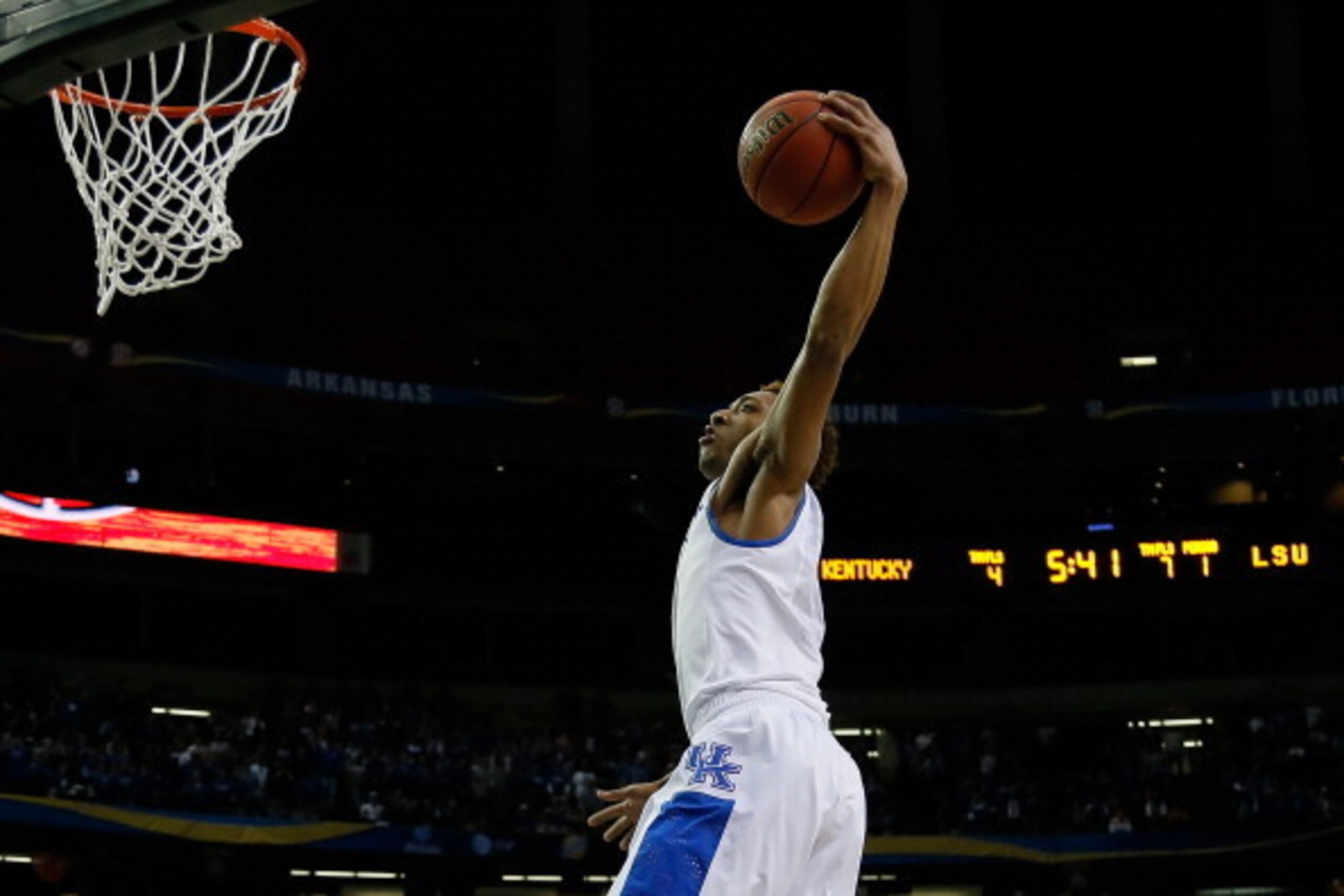 ATLANTA, GA - MARCH 14:  James Young #1 of the Kentucky Wildcats dunks against the LSU Tigers during the quarterfinals of the SEC Men's Basketball Tournament at Georgia Dome on March 14, 2014 in Atlanta, Georgia.  (Photo by Kevin C. Cox/Getty Images)