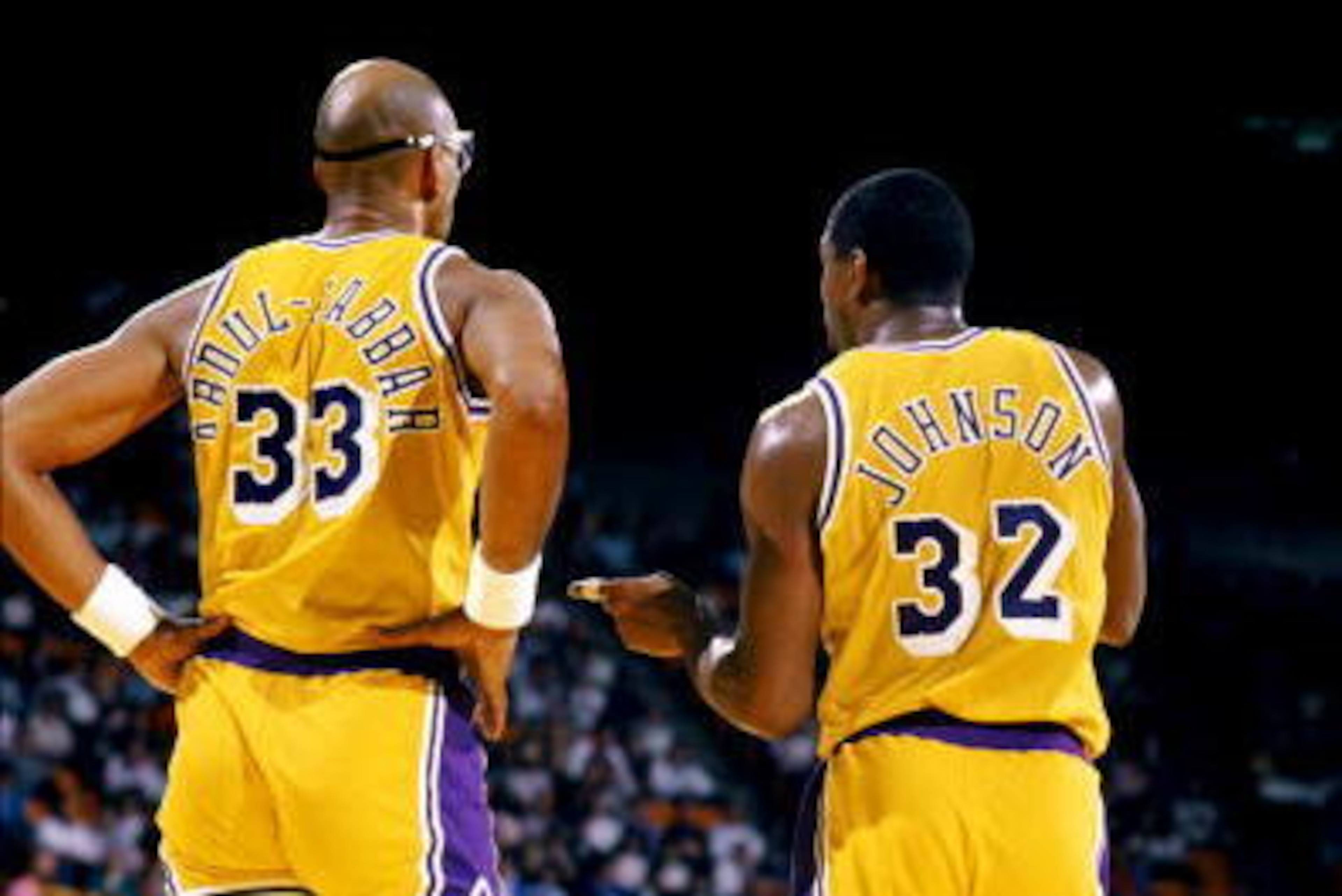 LOS ANGELES - 1988: Kareem Abdul-Jabbar #33 of the Los Angeles Lakers listens to Magic Johnson #32 during an NBA game at the Great Western Forum in Los Angeles, California in 1988. (Photo by Mike Powell/Getty Images) LOS ANGELES - 1988: Kareem Abdul-Jabbar #33 of the Los Angeles Lakers listens to Magic Johnson #32 during an NBA game at the Great Western Forum in Los Angeles, California in 1988. (Photo by Mike Powell/Getty Images)