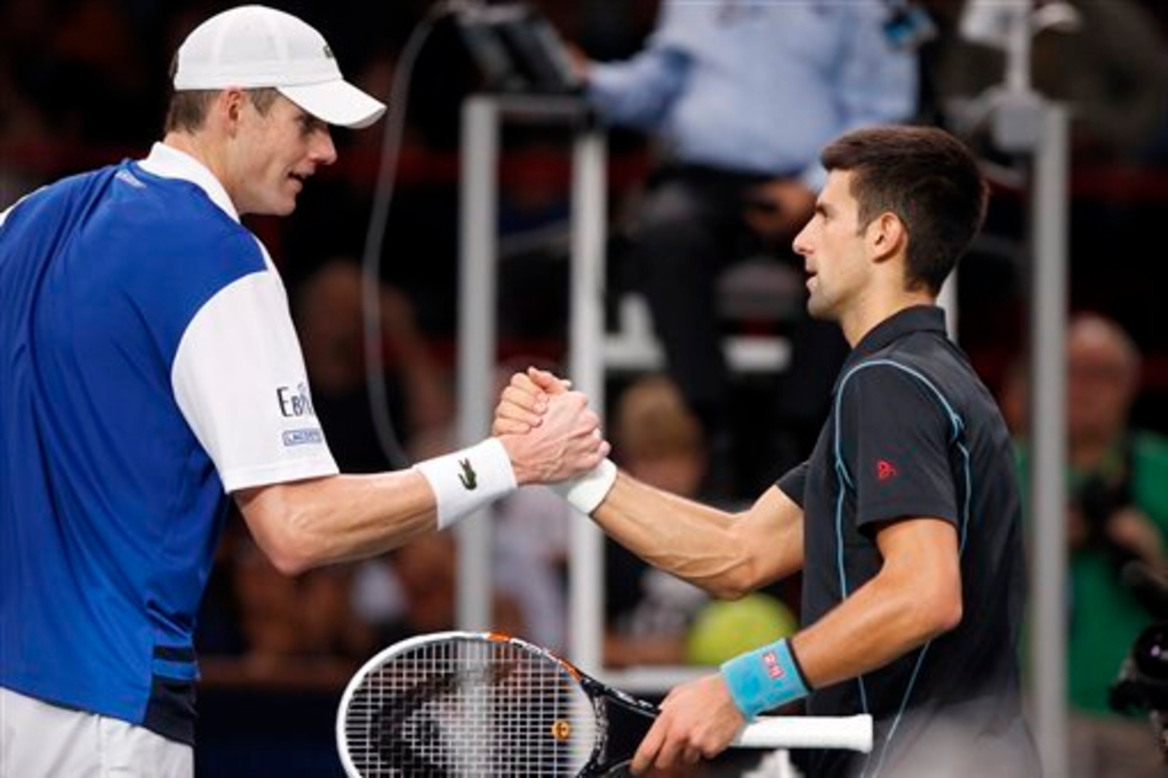 John Isner and Novak Djokovic