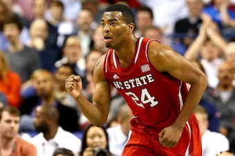 GREENSBORO, NC - MARCH 14:  T.J. Warren #24 of the North Carolina State Wolfpack reacts as he runs up the court against the Syracuse Orange during the quarterfinals of the 2014 Men's ACC Basketball Tournament at Greensboro Coliseum on March 14, 2014 in Gr