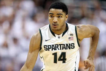 Mar 1, 2014; East Lansing, MI, USA; Michigan State Spartans guard Gary Harris (14) brings the ball up court against the Illinois Fighting Illini during the 2nd half of a game at Jack Breslin Student Events Center. Illinois won 53-46. Mandatory Credit: Mik Mar 1, 2014; East Lansing, MI, USA; Michigan State Spartans guard Gary Harris (14) brings the ball up court against the Illinois Fighting Illini during the 2nd half of a game at Jack Breslin Student Events Center. Illinois won 53-46. Mandatory Credit: Mik