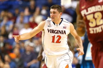 GREENSBORO, NC - MARCH 14:  Joe Harris #12 of the Virginia Cavaliers reacts after a basket against the Florida State Seminoles during the quarterfinals of the 2014 Men's ACC Basketball Tournament at Greensboro Coliseum on March 14, 2014 in Greensboro, Nor
