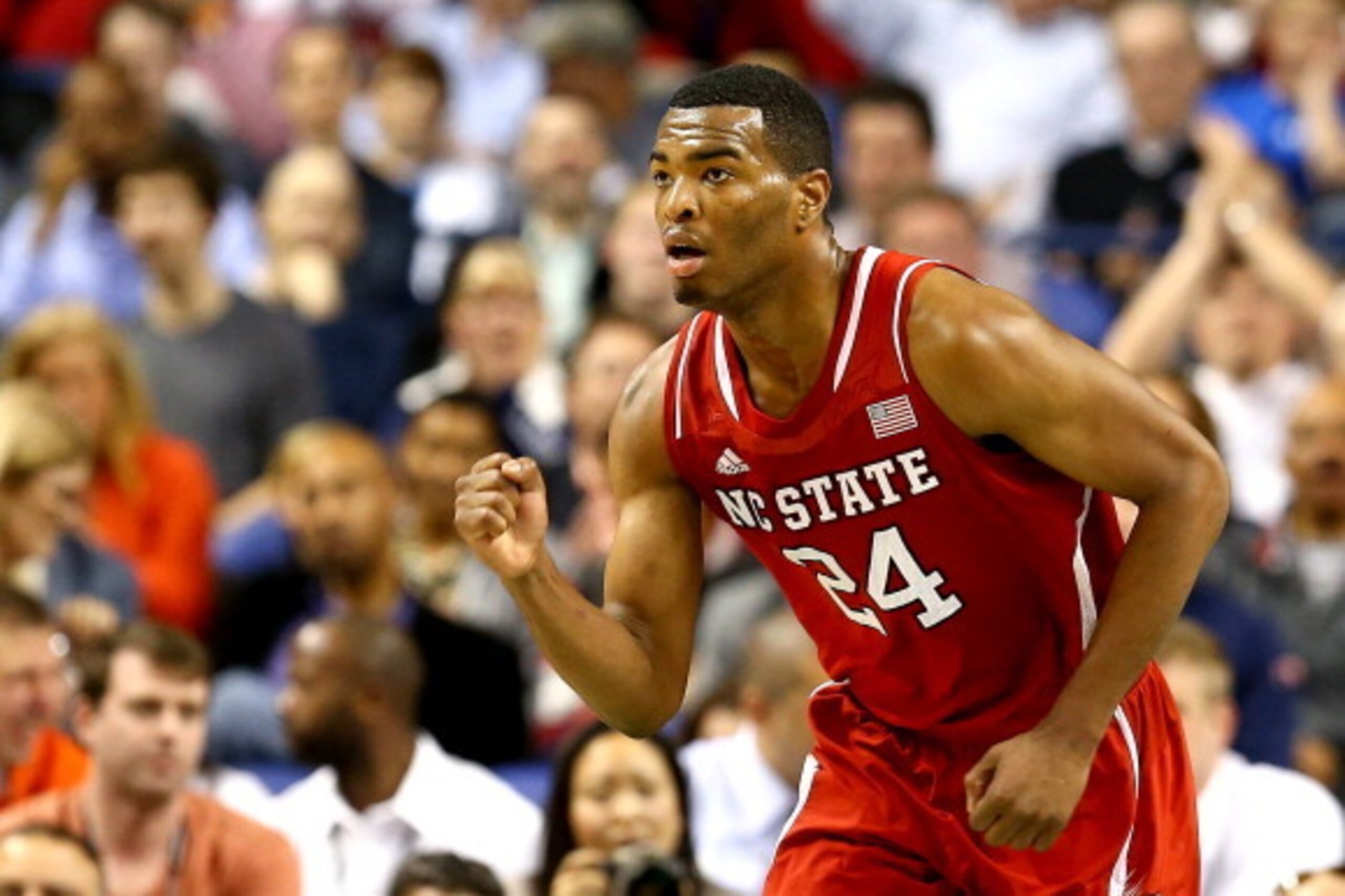 GREENSBORO, NC - MARCH 14:  T.J. Warren #24 of the North Carolina State Wolfpack reacts as he runs up the court against the Syracuse Orange during the quarterfinals of the 2014 Men's ACC Basketball Tournament at Greensboro Coliseum on March 14, 2014 in Gr