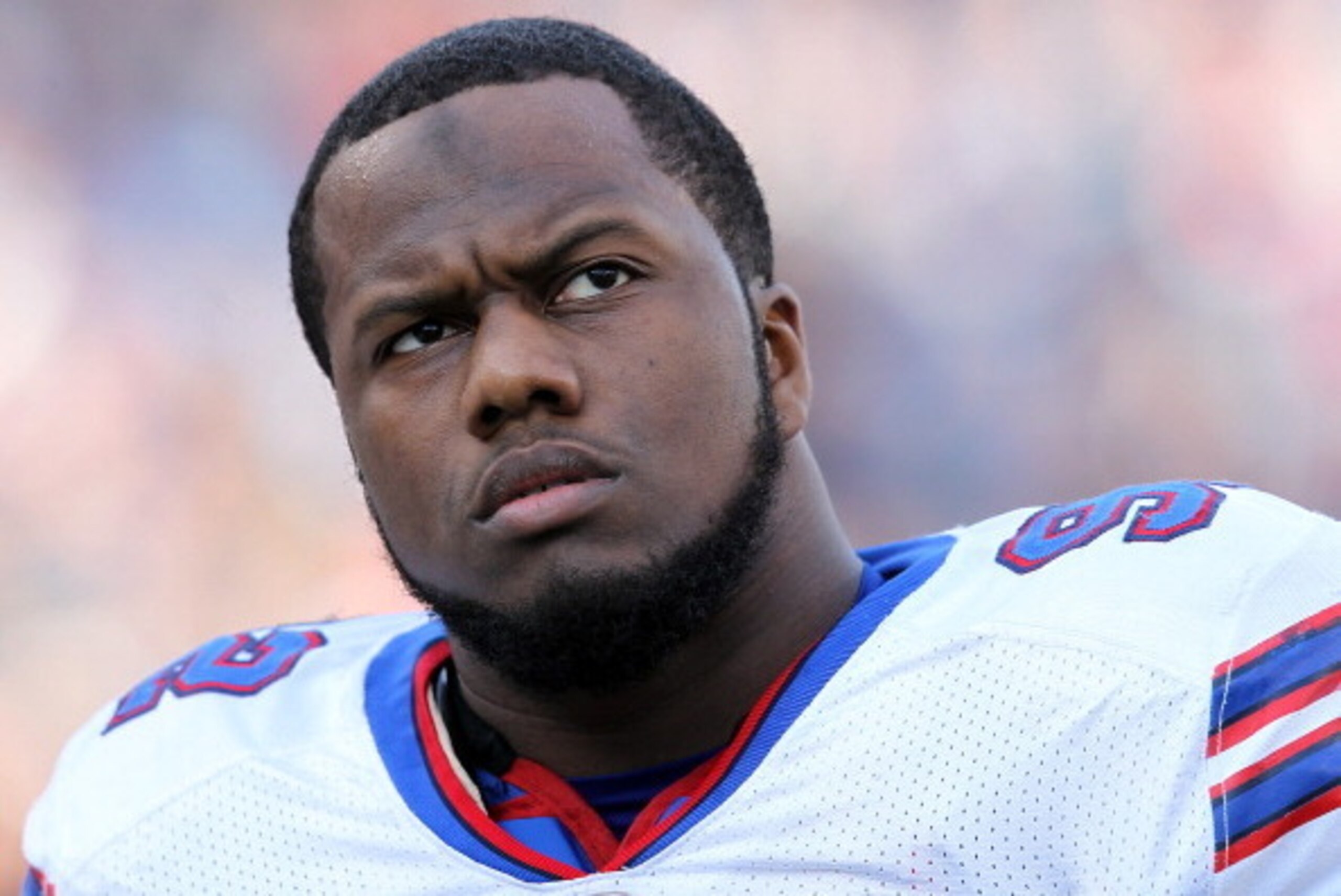 FOXBORO, MA - JANUARY 1:   Alex Carrington #92 of the Buffalo Bills prepares before a game against the New England Patriots at Gillette Stadium on January 1, 2012 in Foxboro, Massachusetts. (Photo by Jim Rogash/Getty Images)