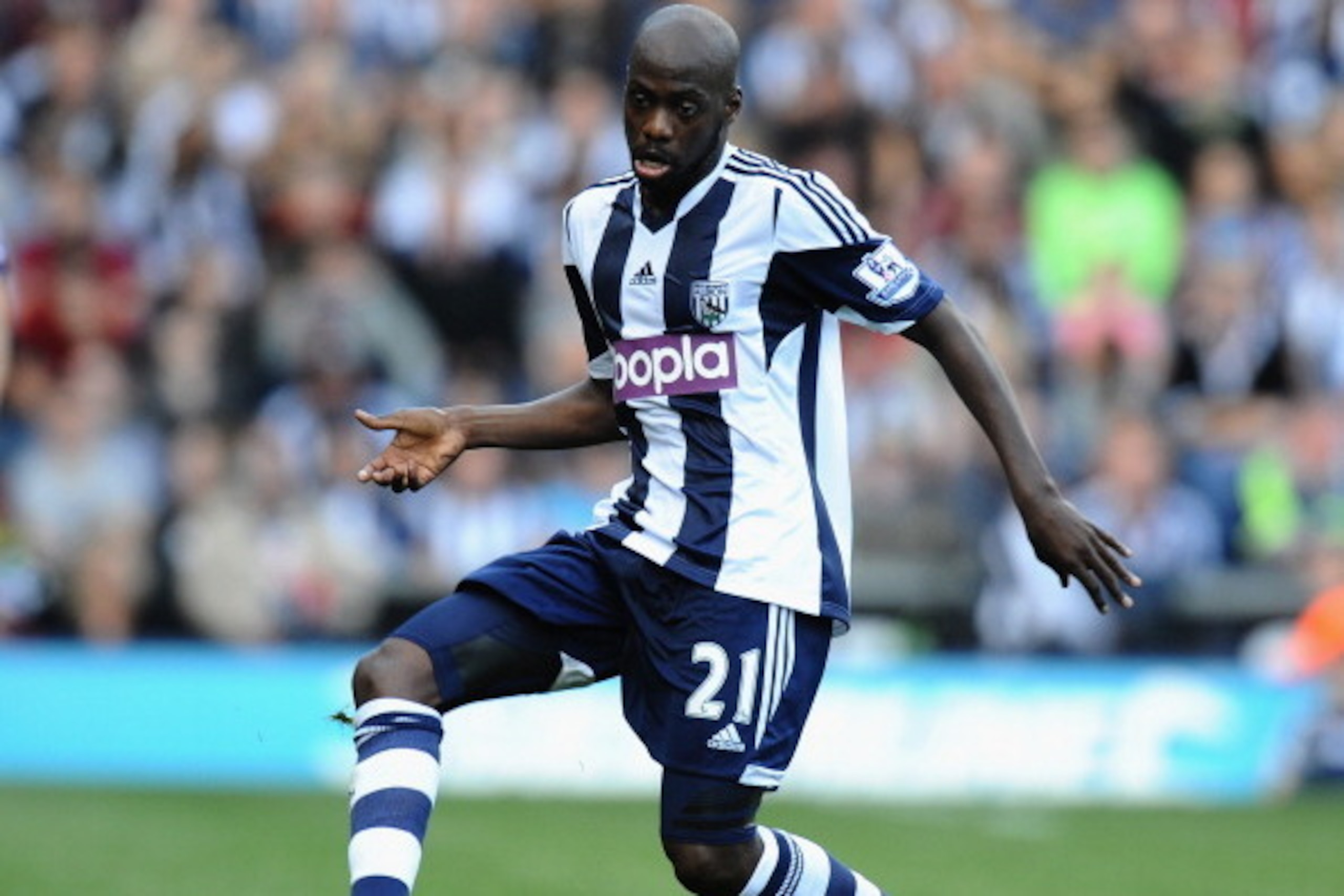 WEST BROMWICH, ENGLAND - SEPTEMBER 21:  Youssouf Mulumbu of West Bromwich Albion during the Barclays Premier League match between West Bromwich Albion and Sunderland at The Hawthorns on September 21, 2013 in West Bromwich, England.  (Photo by Tony Marshal