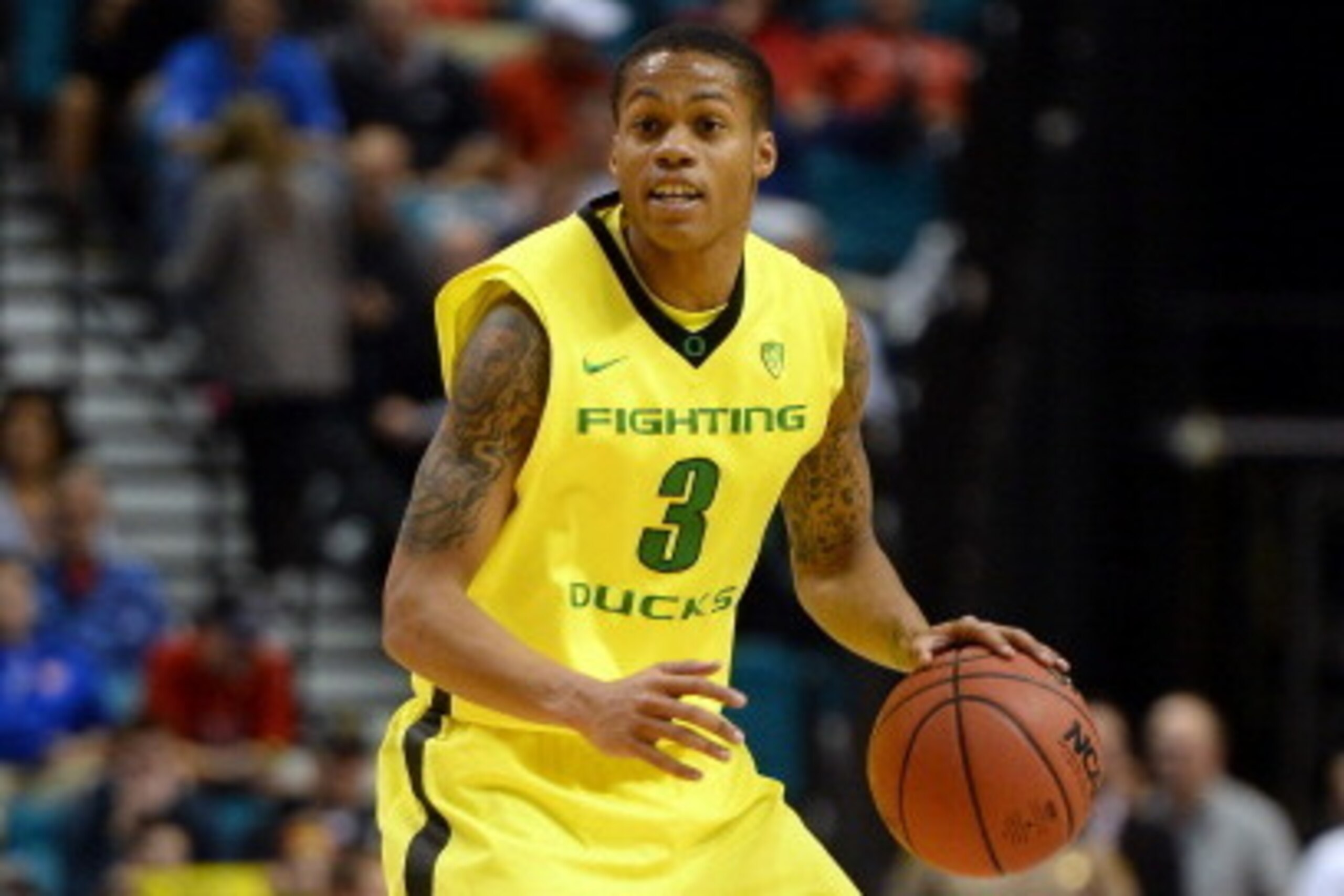 LAS VEGAS, NV - MARCH 12: Joseph Young #3 of the Oregon Ducks brings the ball up the court against the Oregon State Beavers during a first-round game of the Pac-12 Basketball Tournament at the MGM Grand Garden Arena on March 12, 2014 in Las Vegas, Nevada LAS VEGAS, NV - MARCH 12: Joseph Young #3 of the Oregon Ducks brings the ball up the court against the Oregon State Beavers during a first-round game of the Pac-12 Basketball Tournament at the MGM Grand Garden Arena on March 12, 2014 in Las Vegas, Nevada