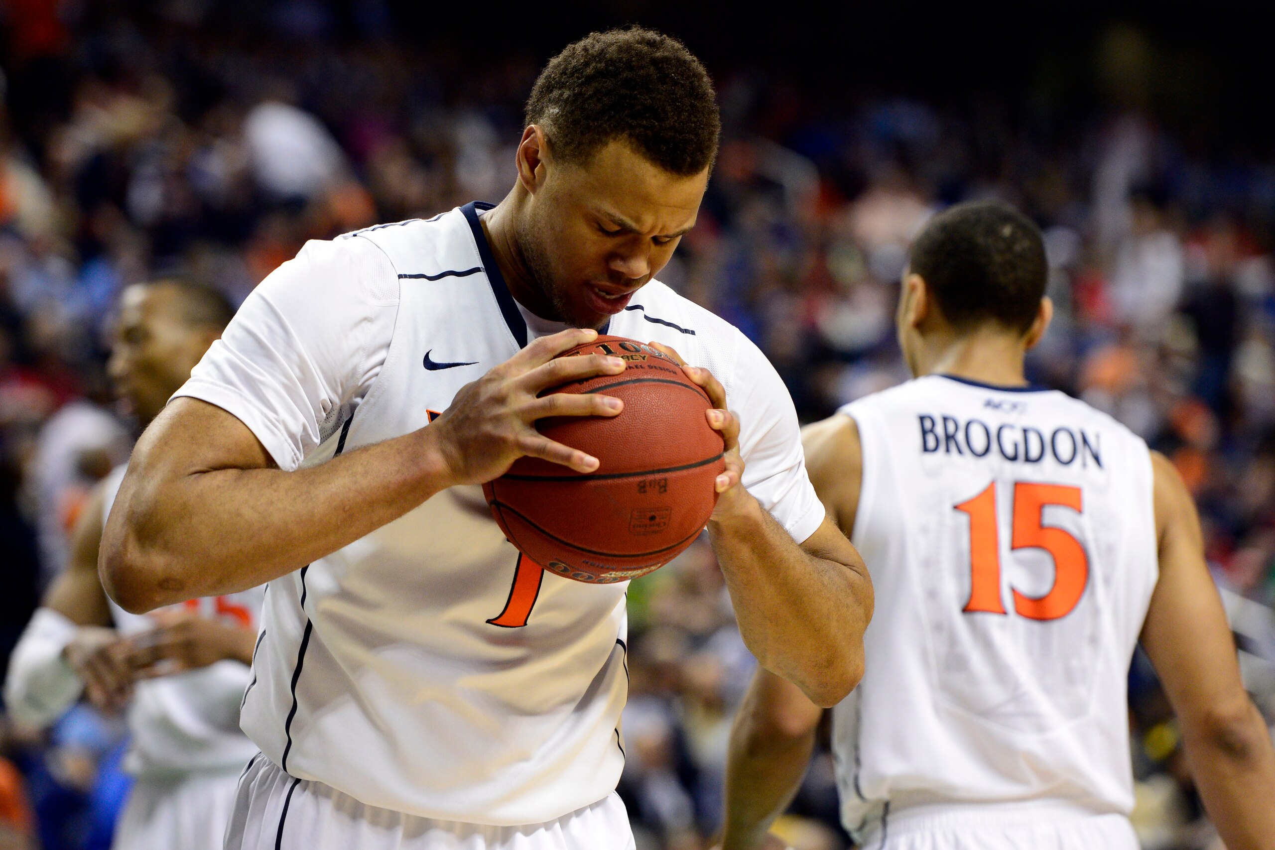 Mar 15, 2014; Greensboro, NC, USA; Virginia Cavaliers guard Justin Anderson (1) reacts to a foul call during their game against the Pittsburgh Panthers in the semifinals of the ACC college basketball tournament at Greensboro Coliseum. Mandatory Credit: Jo