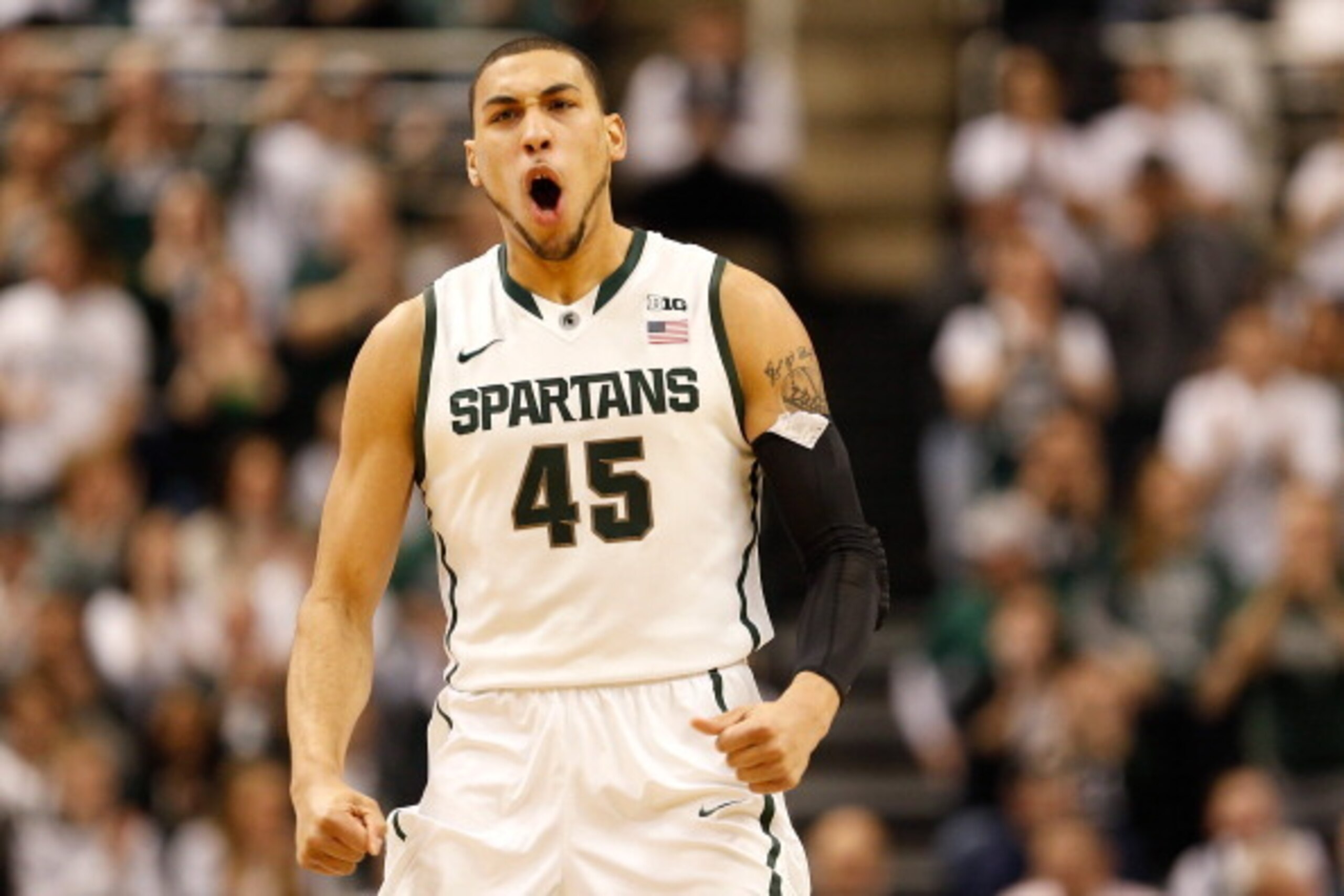 EAST LANSING, MI - FEBRUARY 06:  Denzel Valentine #45 of the Michigan State Spartans reacts during the first half while playing the Iowa Hawkeyes at the Jack T. Breslin Student Events Center on February 6, 2014 in East Lansing, Michigan. (Photo by Gregory