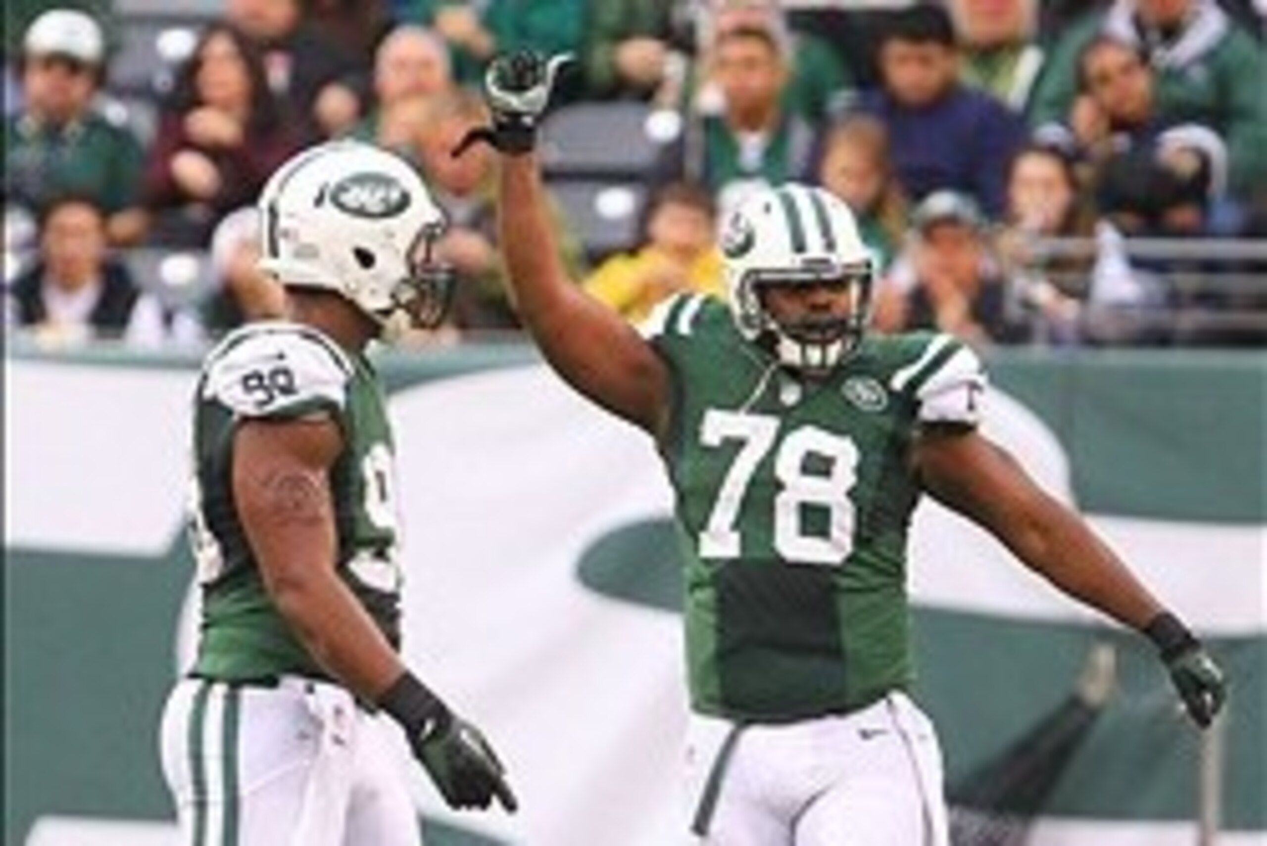 Dec 22, 2013; East Rutherford, NJ, USA; New York Jets defensive tackle Leger Douzable (78) celebrates his sack of Cleveland Browns quarterback Jason Campbell (not shown) during the second half at MetLife Stadium.  The Jets defeated the Browns 24-13.  Mand