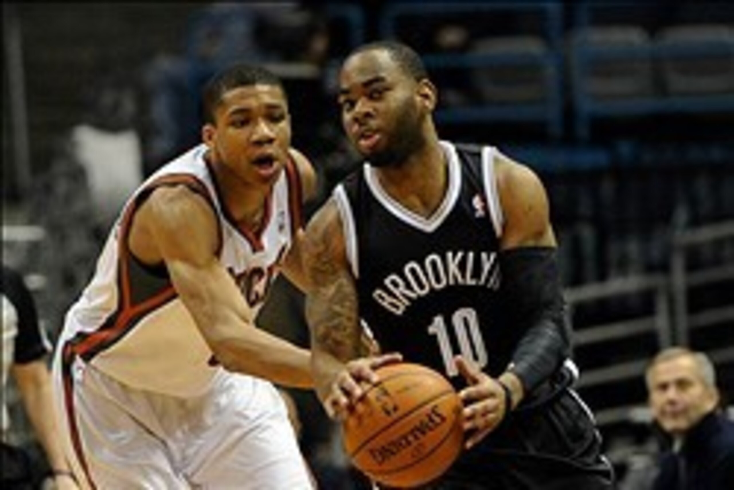 Mar 1, 2014; Milwaukee, WI, USA;  Brooklyn Nets guard Marcus Thornton (10) tries to get around Milwaukee Bucks guard Giannis Antetokounmpo (34) in the 4th quarter at BMO Harris Bradley Center.   Mandatory Credit: Benny Sieu-USA TODAY Sports