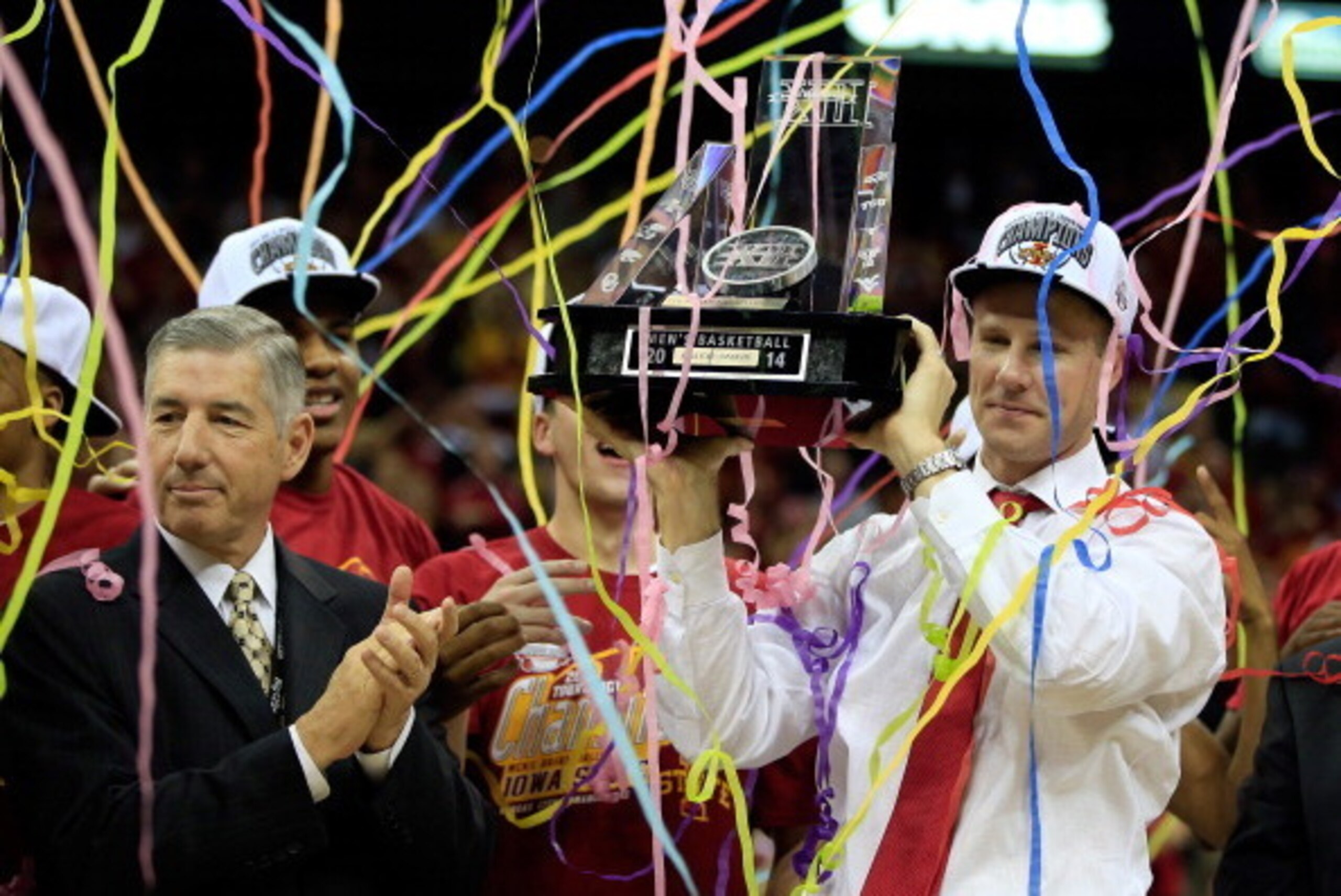 KANSAS CITY, MO - MARCH 15: Head coach Fred Hoiberg of the Iowa State Cyclones holds up the trophy after winning the 2014 Big 12 Men's Championship over the Baylor Bears at the Sprint Center on March 15, 2014 in Kansas City, Missouri. (Photo by Jamie Sq KANSAS CITY, MO - MARCH 15: Head coach Fred Hoiberg of the Iowa State Cyclones holds up the trophy after winning the 2014 Big 12 Men's Championship over the Baylor Bears at the Sprint Center on March 15, 2014 in Kansas City, Missouri. (Photo by Jamie Sq