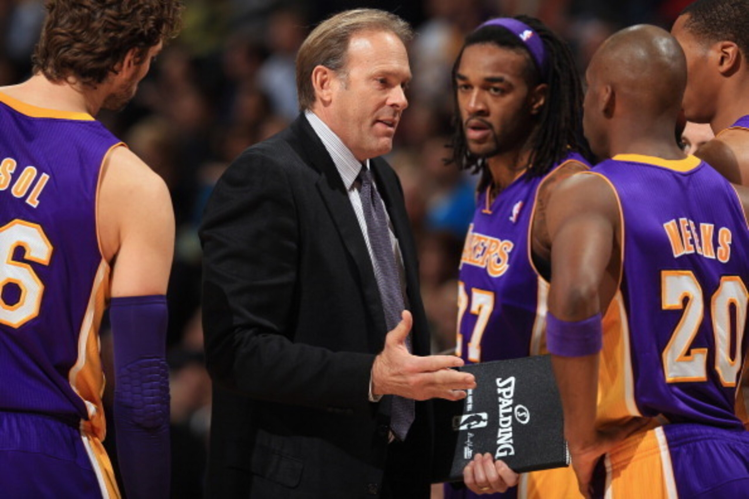 DENVER, CO - NOVEMBER 13:  Assistant coach Kurt Rambis of the Los Angeles Lakers directs Pau Gasol #16, Jordan Hill #27 and Jodie Meeks #20 of the Los Angeles Lakers against the Denver Nuggets at Pepsi Center on November 13, 2013 in Denver, Colorado. The 