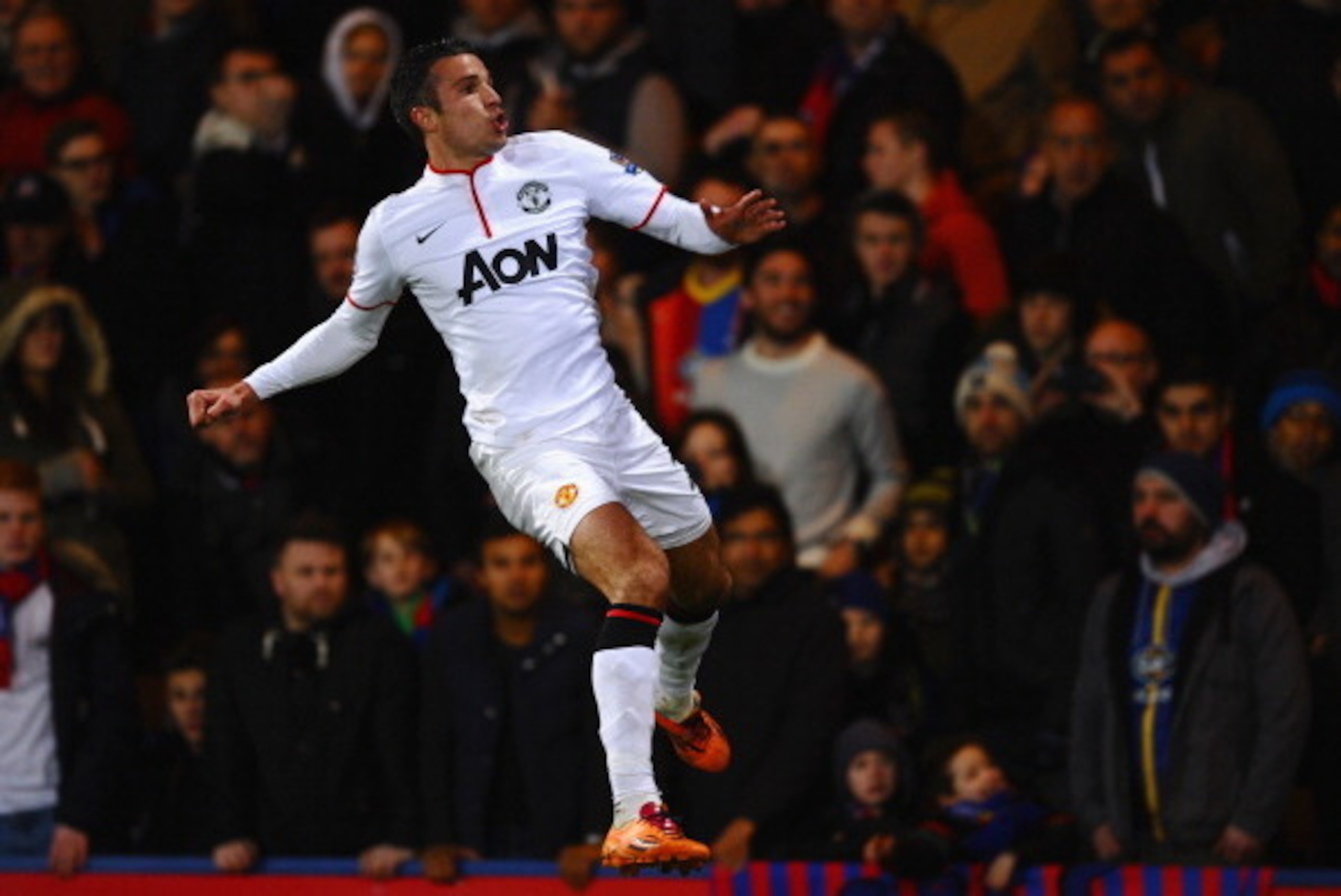 LONDON, ENGLAND - FEBRUARY 22:  Robin Van Persie of Manchester United jumps for joy as he celebrates the first goal during the Barclays Premier League match between Crystal Palace and Manchester United at Selhurst Park on February 22, 2014 in London, Engl