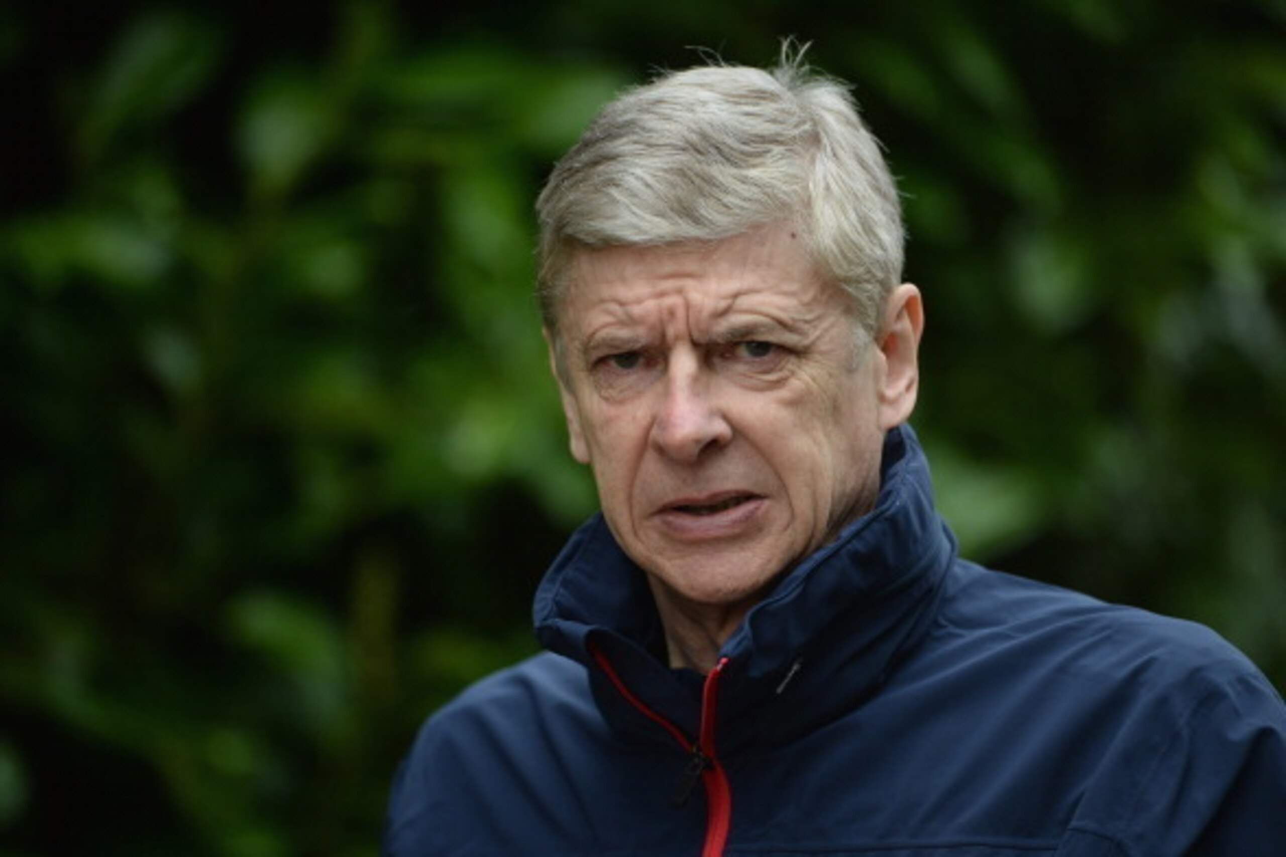 ST ALBANS, ENGLAND - MARCH 10:  Arsenal manager Arsene Wenger looks on during the Arsenal training session at London Colney on March 10, 2014 in St Albans, England.  (Photo by Michael Regan/Getty Images)