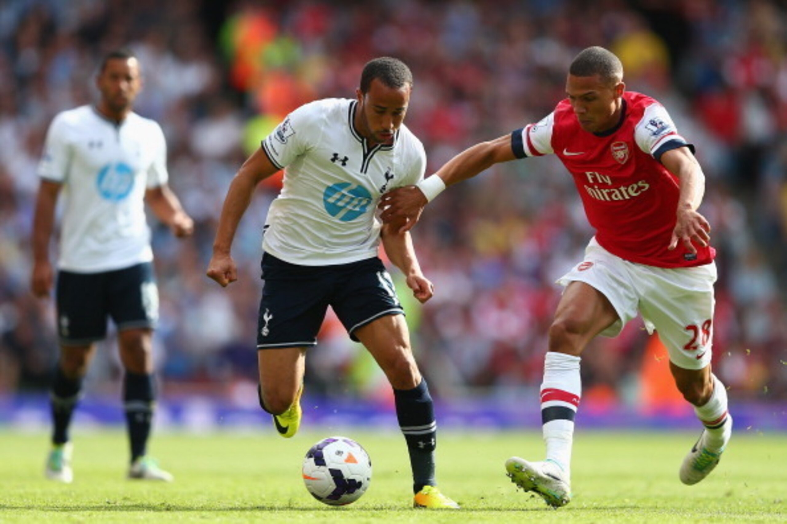 LONDON, ENGLAND - SEPTEMBER 01:  Andros Townsend of Tottenham Hotspur is challenged by Kieran Gibbs of Arsenal during the Barclays Premier League match between Arsenal and Tottenham Hotspur at Emirates Stadium on September 01, 2013 in London, England.  (P