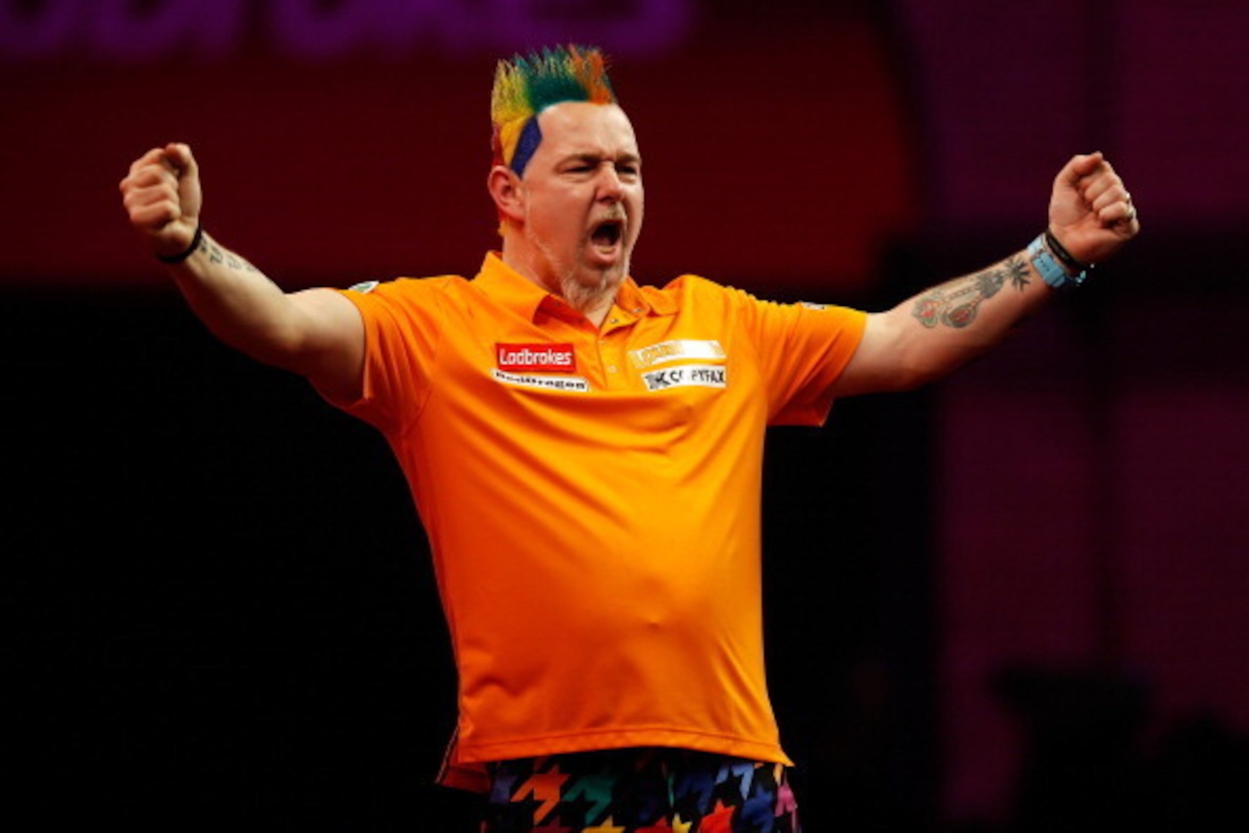 LONDON, ENGLAND - DECEMBER 28:  Peter Wright of England celebrates victory during his quarter final match against Wes Newton of England on day thirteen of the Ladbrokes.com World Darts Championship at Alexandra Palace on December 28, 2013 in London, Engla