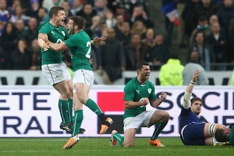 PARIS, FRANCE - MARCH 15:  Brian O'Driscoll of Ireland celebrates with Fergus McFadden as the final whistle is blown and Ireland win the six nations championship with a 22-20 victory over France during the RBS Six Nations match between France and Ireland 