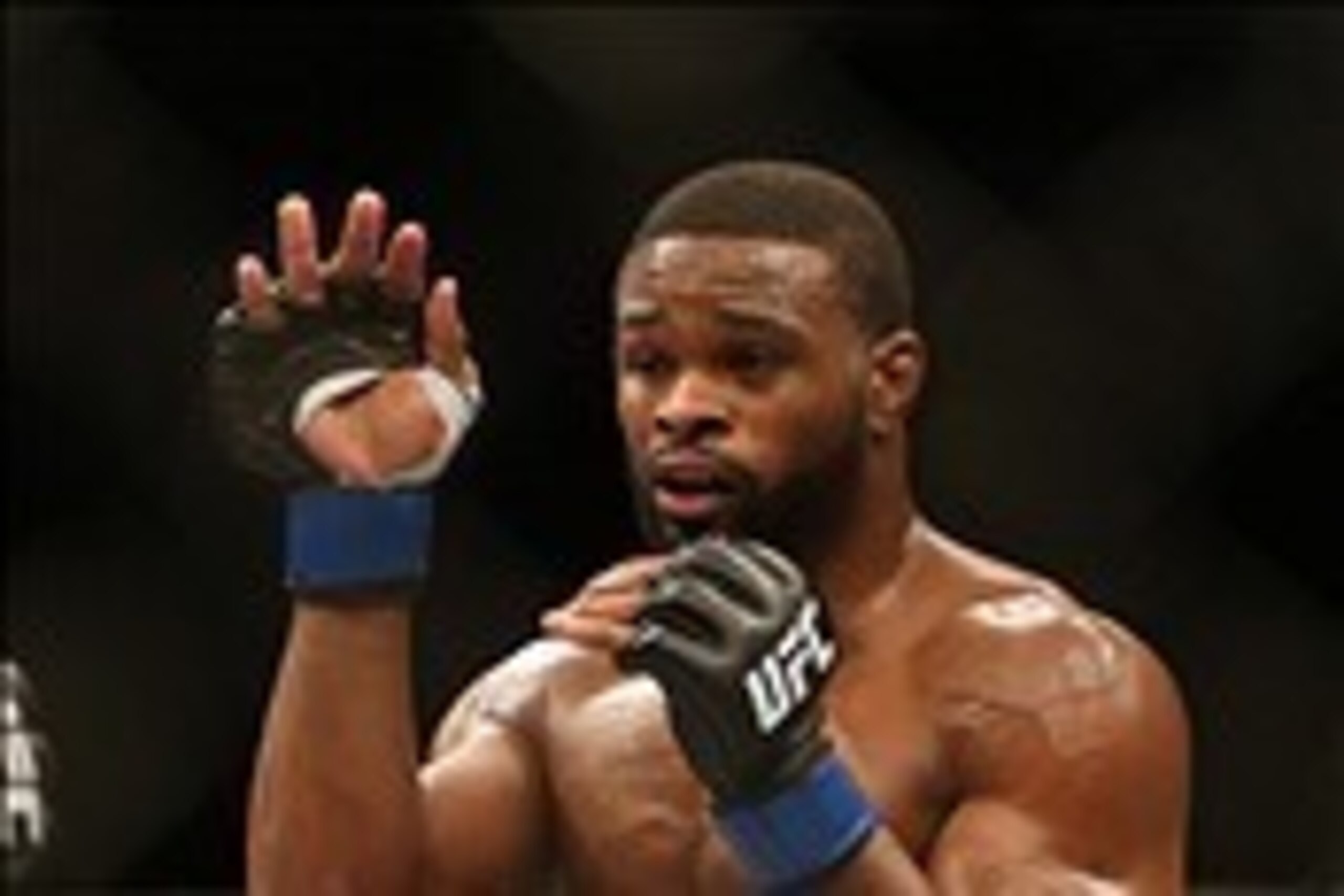 Jun 15, 2013; Winnipeg, MB, Canada; Tyron Woodley fights Jake Shields (left) during their Welterweight bout at UFC 161 at MTS Centre. Mandatory Credit: Tom Szczerbowski-USA TODAY Sports Jun 15, 2013; Winnipeg, MB, Canada; Tyron Woodley fights Jake Shields (left) during their Welterweight bout at UFC 161 at MTS Centre. Mandatory Credit: Tom Szczerbowski-USA TODAY Sports