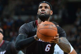 SAN ANTONIO, TX - MARCH 6: LeBron James #6 of the Miami Heat takes a free throw against the San Antonio Spurs at the AT&T Center March 6, 2014 in San Antonio, Texas. NOTE TO USER: User expressly acknowledges and agrees that, by downloading and or using th