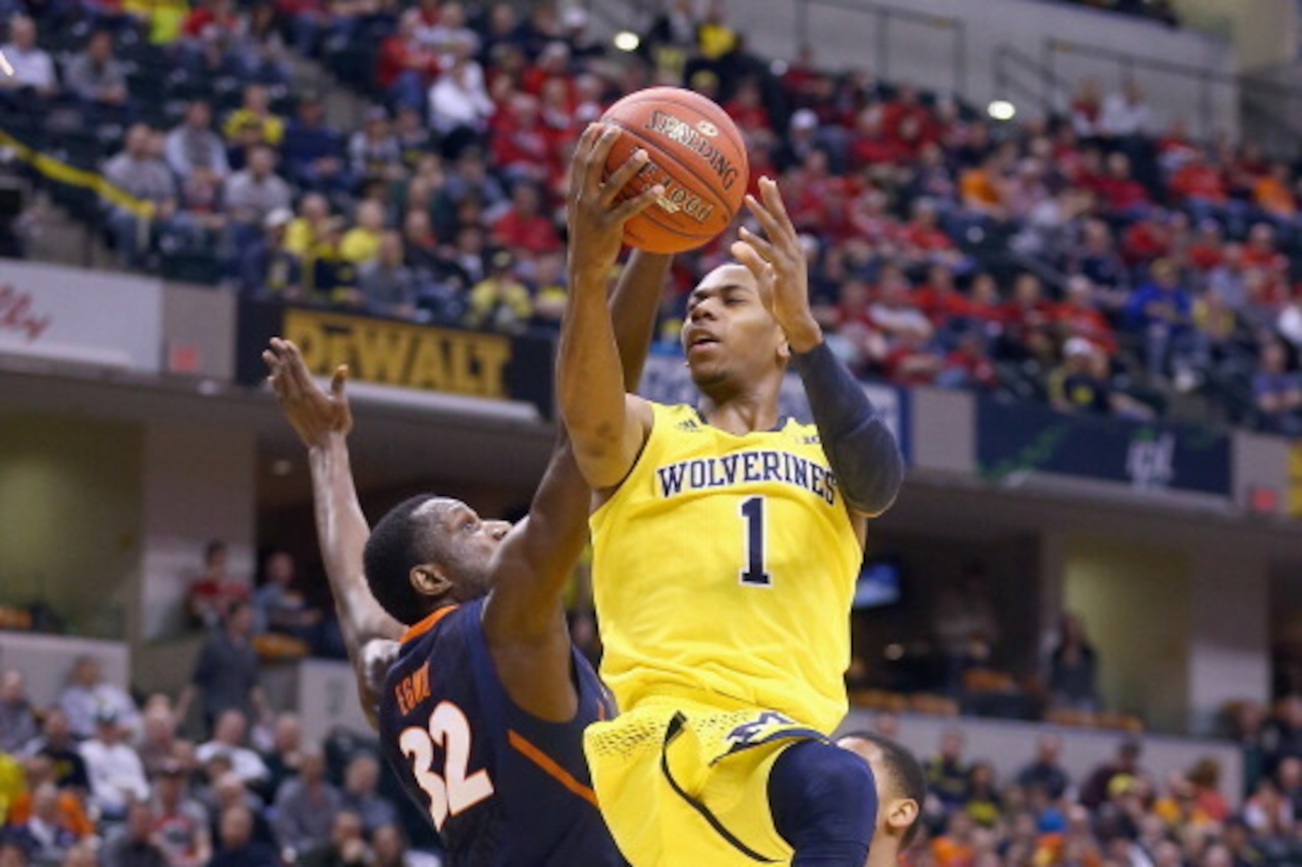 INDIANAPOLIS, IN - MARCH 14:  Glenn Robinson III #1 of the Michigan Wolverines shoots the ball in the game against the Illinois Fighting Illini during the Quarterfinals of the Big Ten Basketball Tournament at Bankers Life Fieldhouse on March 14, 2014 in I