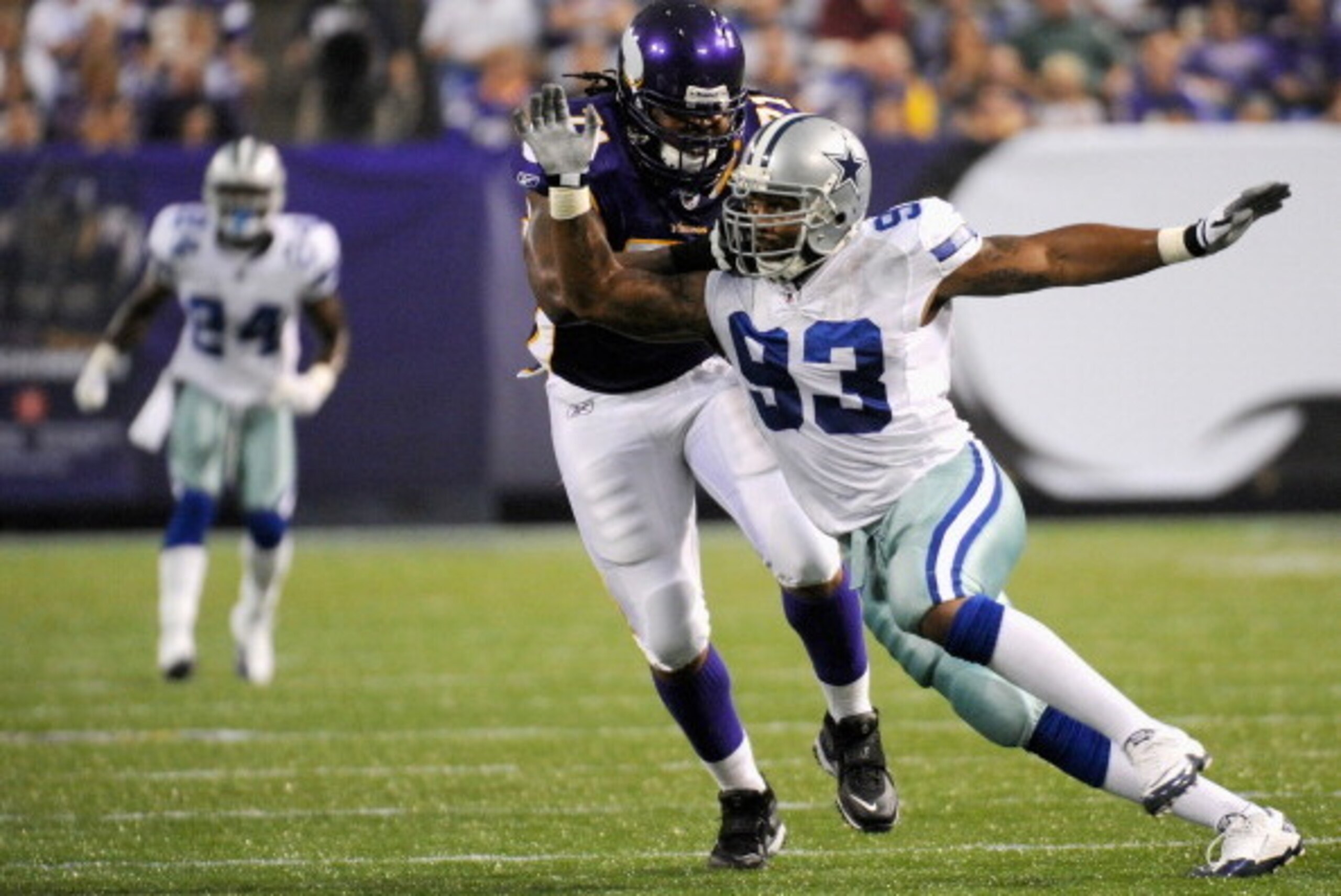 MINNEAPOLIS, MN - AUGUST 27: Phil Loadholt #71 of the Minnesota Vikings makes contact with Anthony Spencer #93 of the Dallas Cowboys on August 27, 2011 at Hubert H. Humphrey Metrodome in Minneapolis, Minnesota. (Photo by Hannah Foslien/Getty Images)